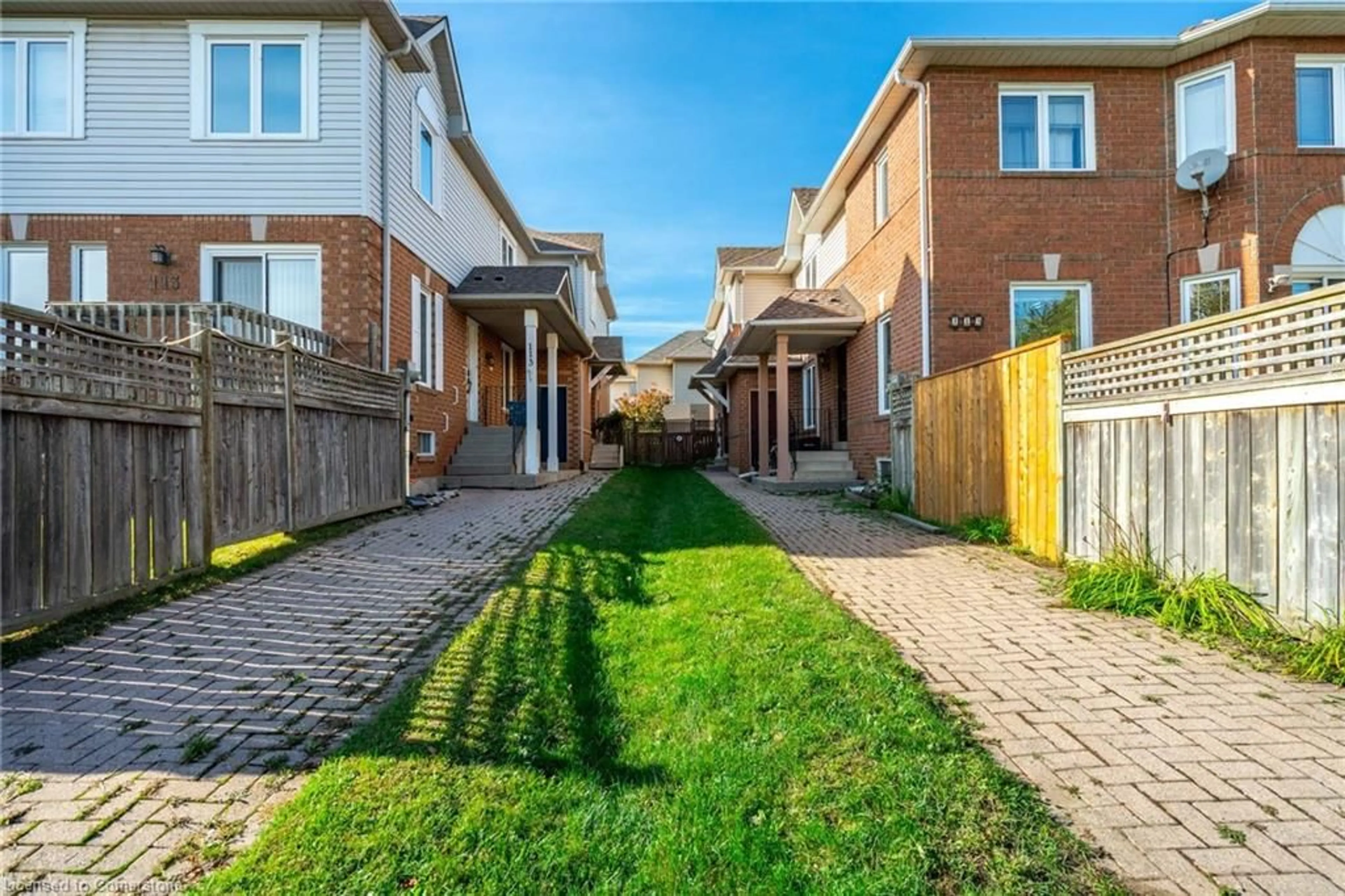 A pic from exterior of the house or condo, the fenced backyard for 117 Laurendale Ave, Waterdown Ontario L8B 0N2