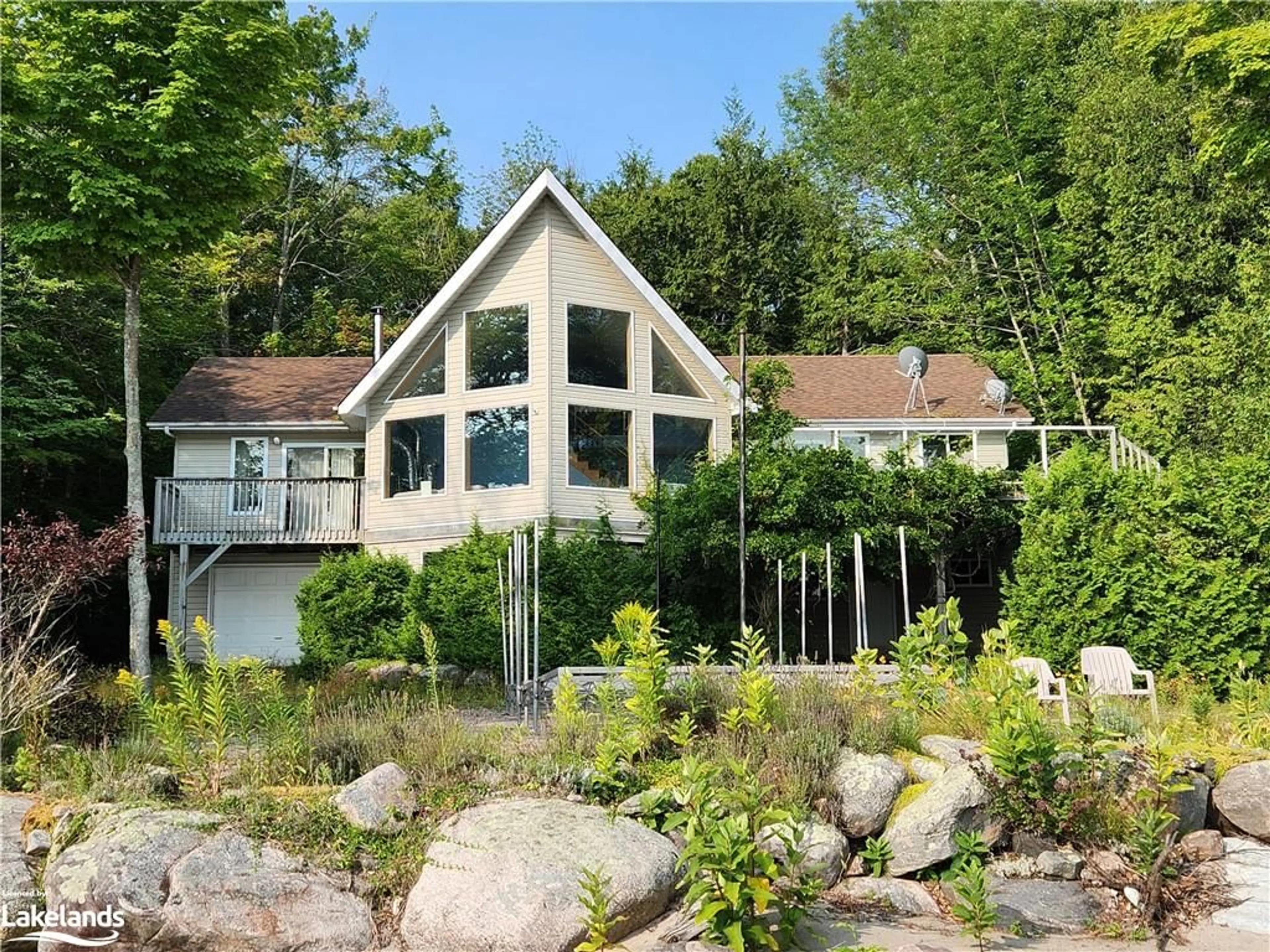 Frontside or backside of a home, cottage for 103 Kchi Sin Miikan Island, Christian Island Ontario L9M 0A9