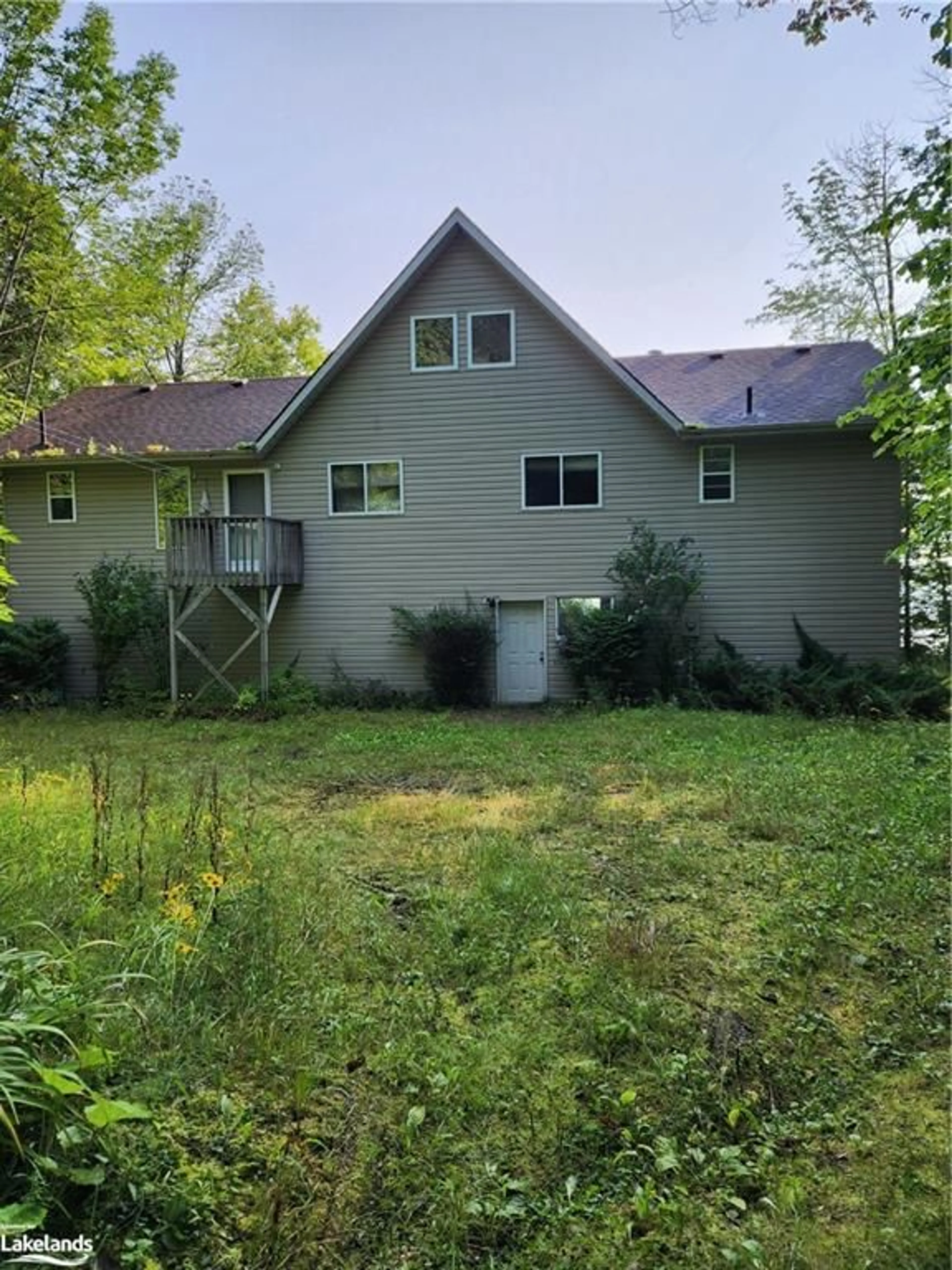 Frontside or backside of a home, cottage for 103 Kchi Sin Miikan Island, Christian Island Ontario L9M 0A9