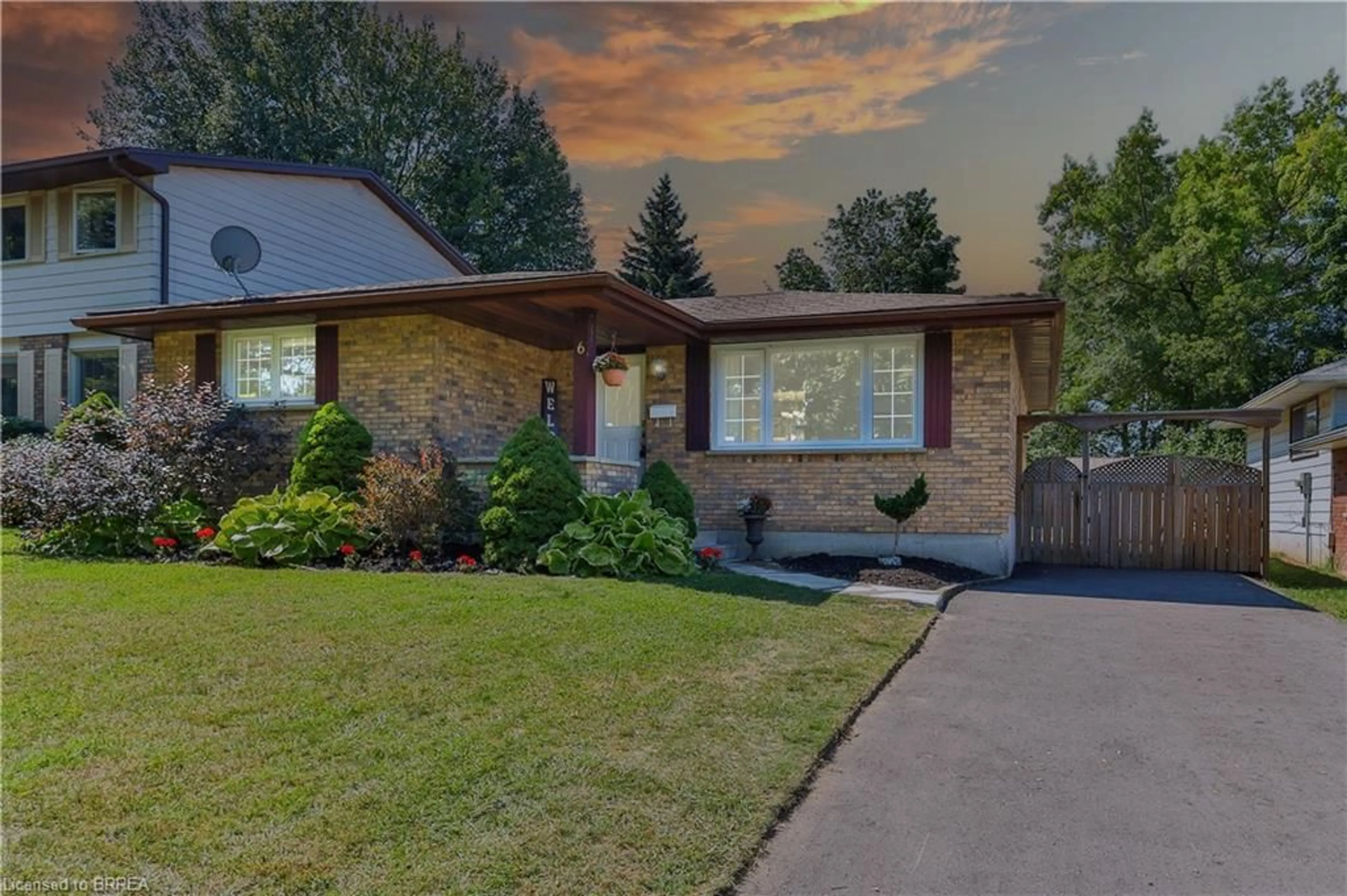 Frontside or backside of a home, the street view for 6 Wildflower Lane, Brantford Ontario N3R 6B4