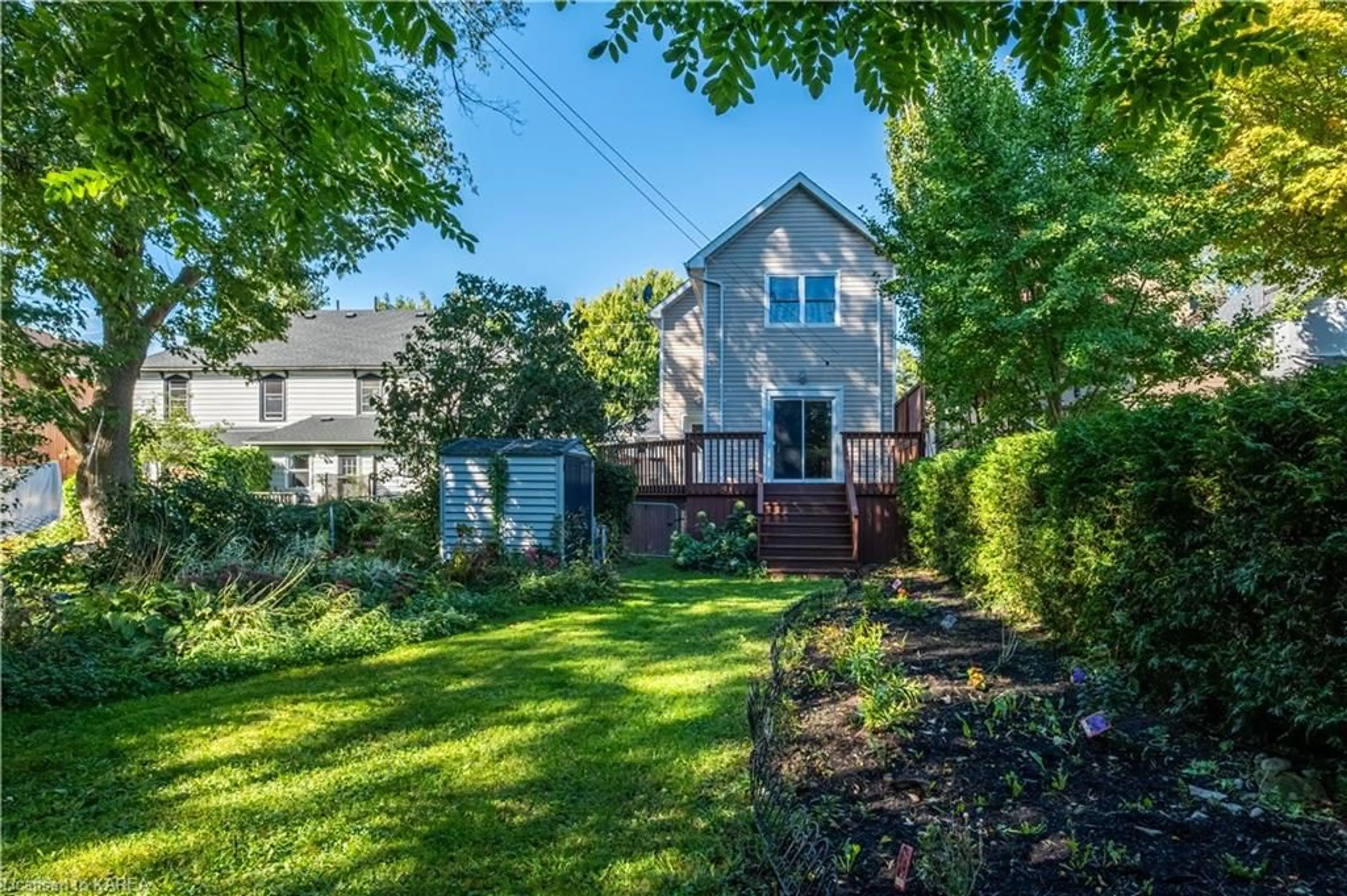 Frontside or backside of a home, the fenced backyard for 95 Livingston Ave, Kingston Ontario K7L 4L3