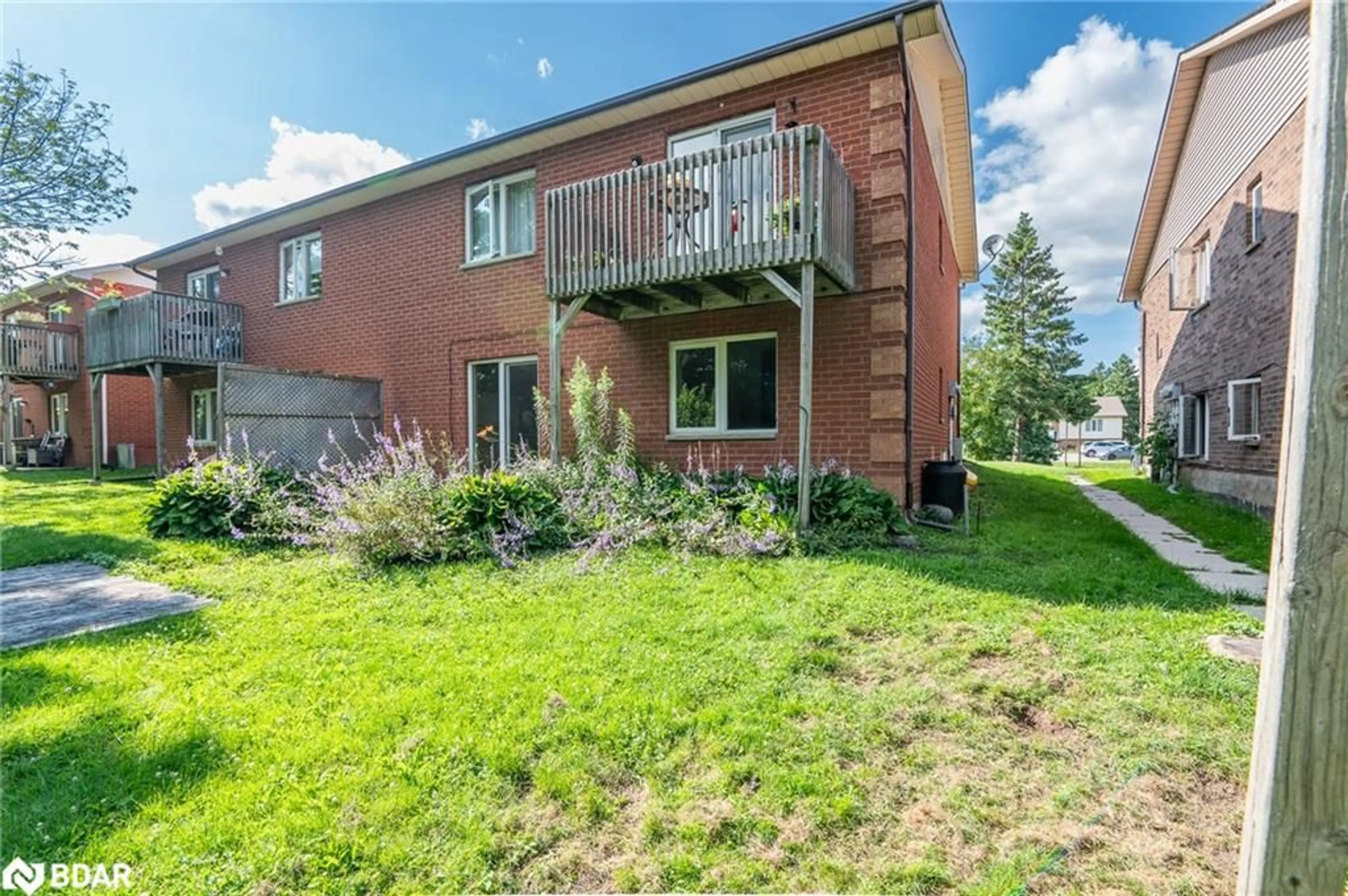 A pic from exterior of the house or condo, the fenced backyard for 209 Sarah Ct Crt, Shelburne Ontario L9V 2Z8