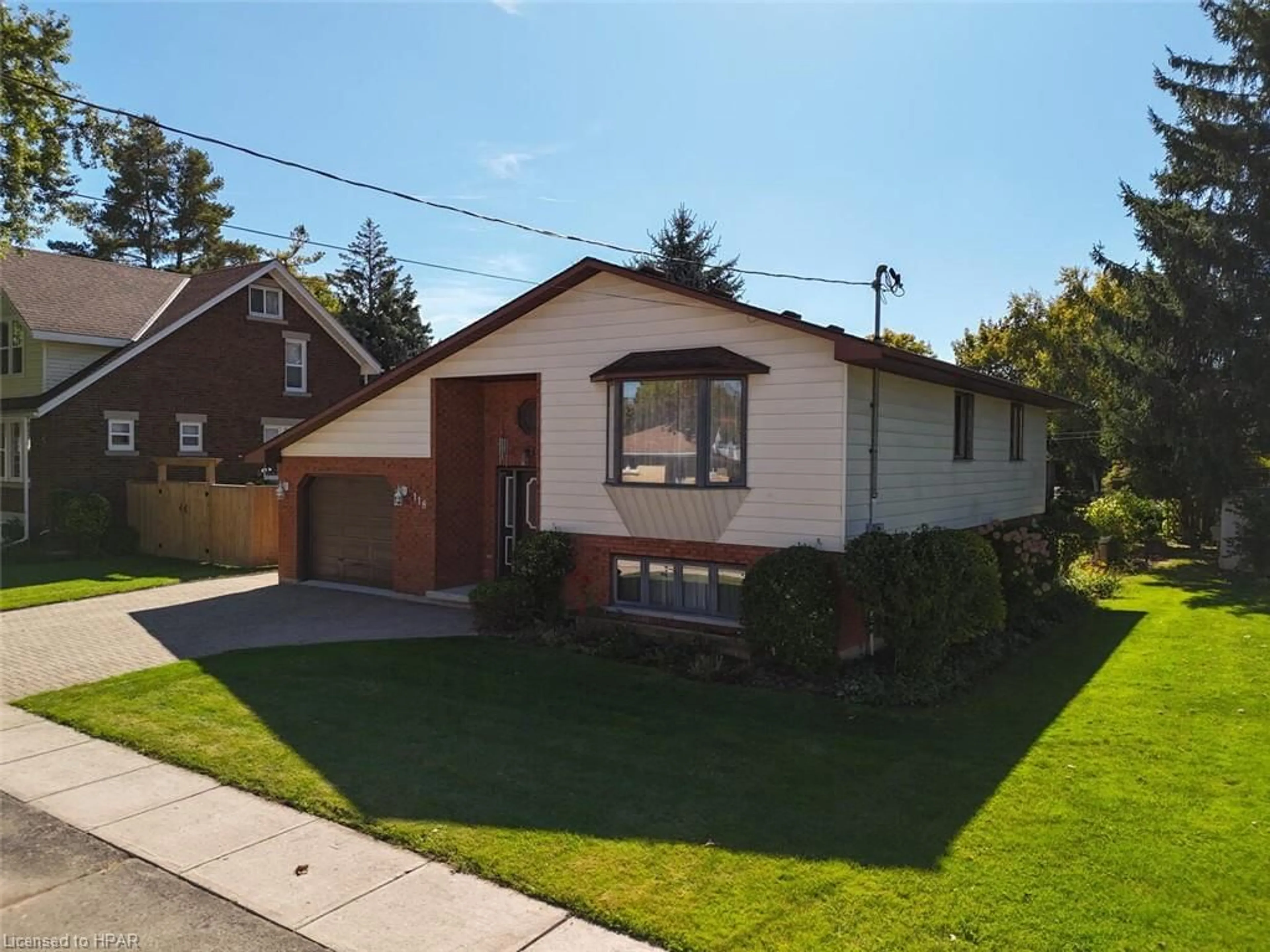 Frontside or backside of a home, the street view for 118 Trafalgar St, Mitchell Ontario N0K 1N0