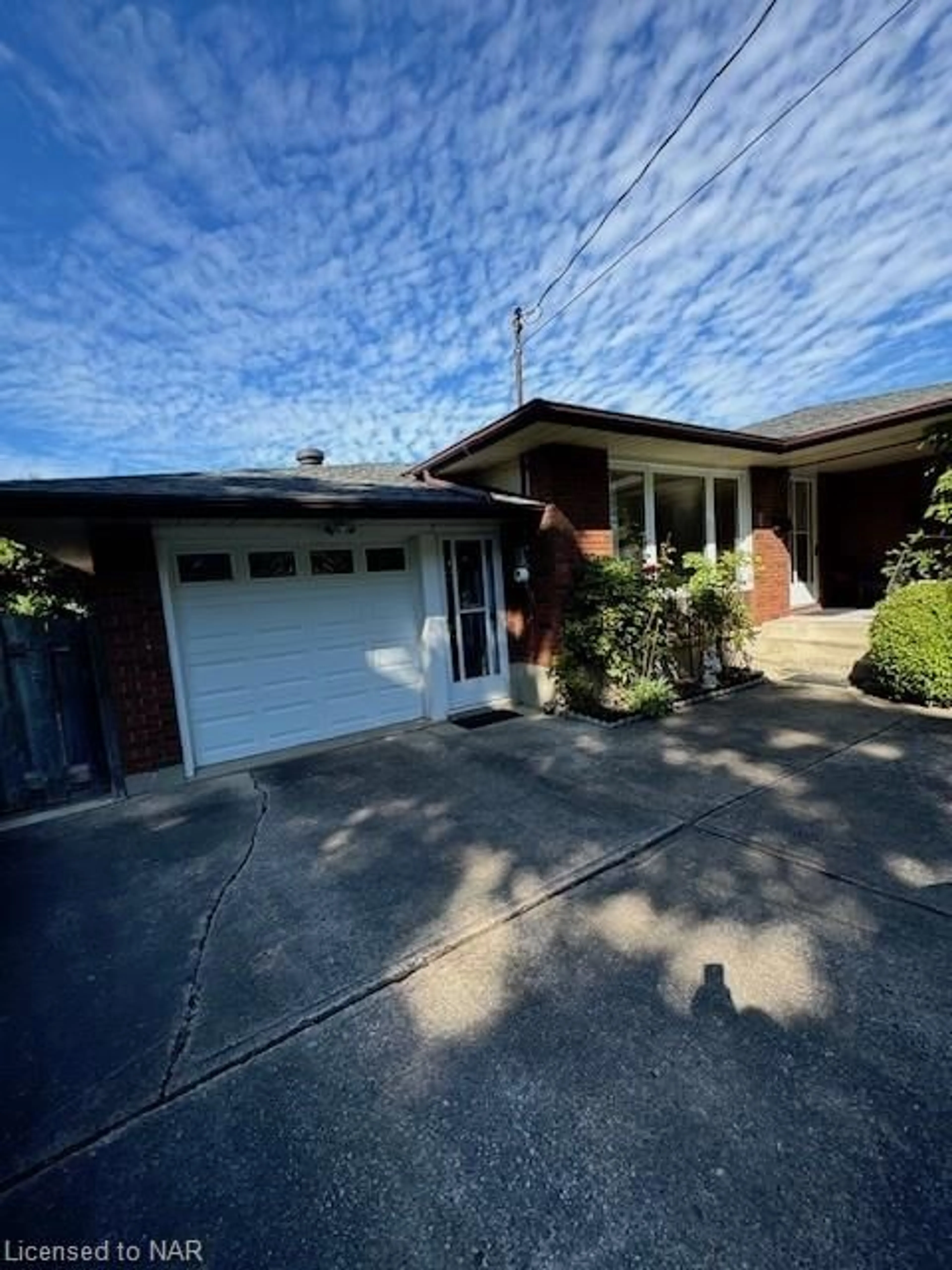 Frontside or backside of a home, the street view for 25 Prince Edward Dr, St. Catharines Ontario L2N 3G9