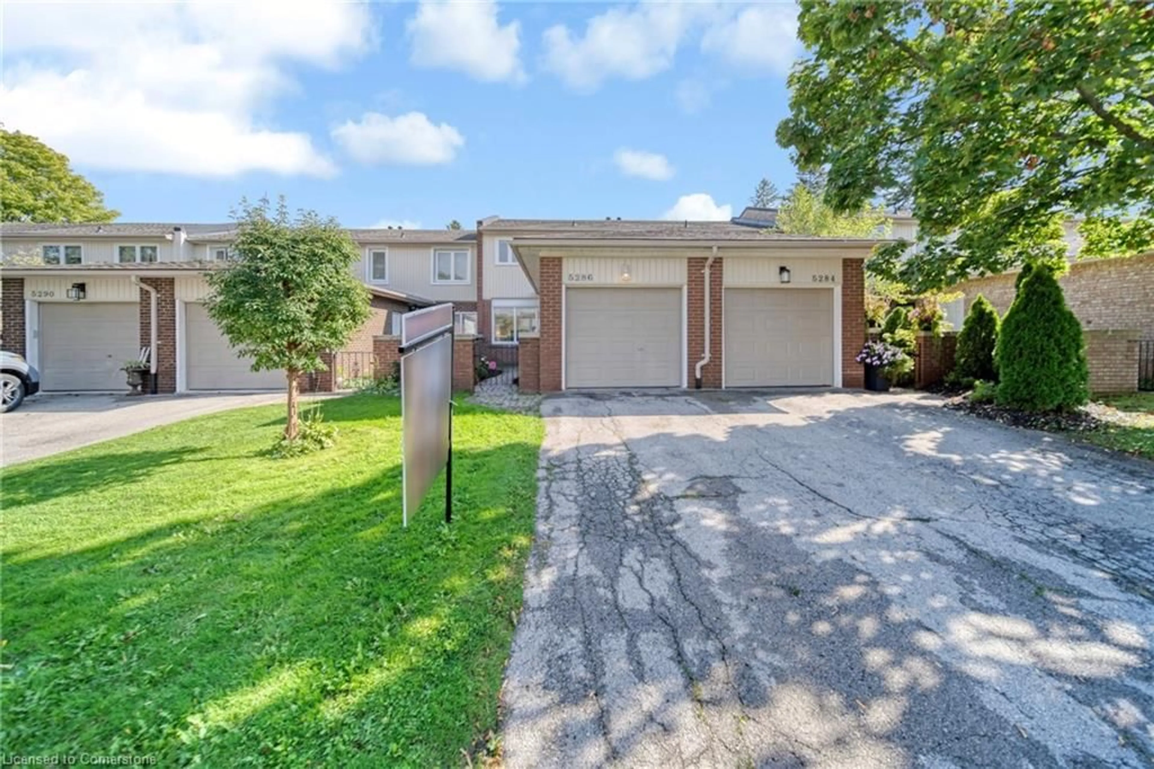 A pic from exterior of the house or condo, the fenced backyard for 5286 Bromley Rd #22, Burlington Ontario L7L 3G2