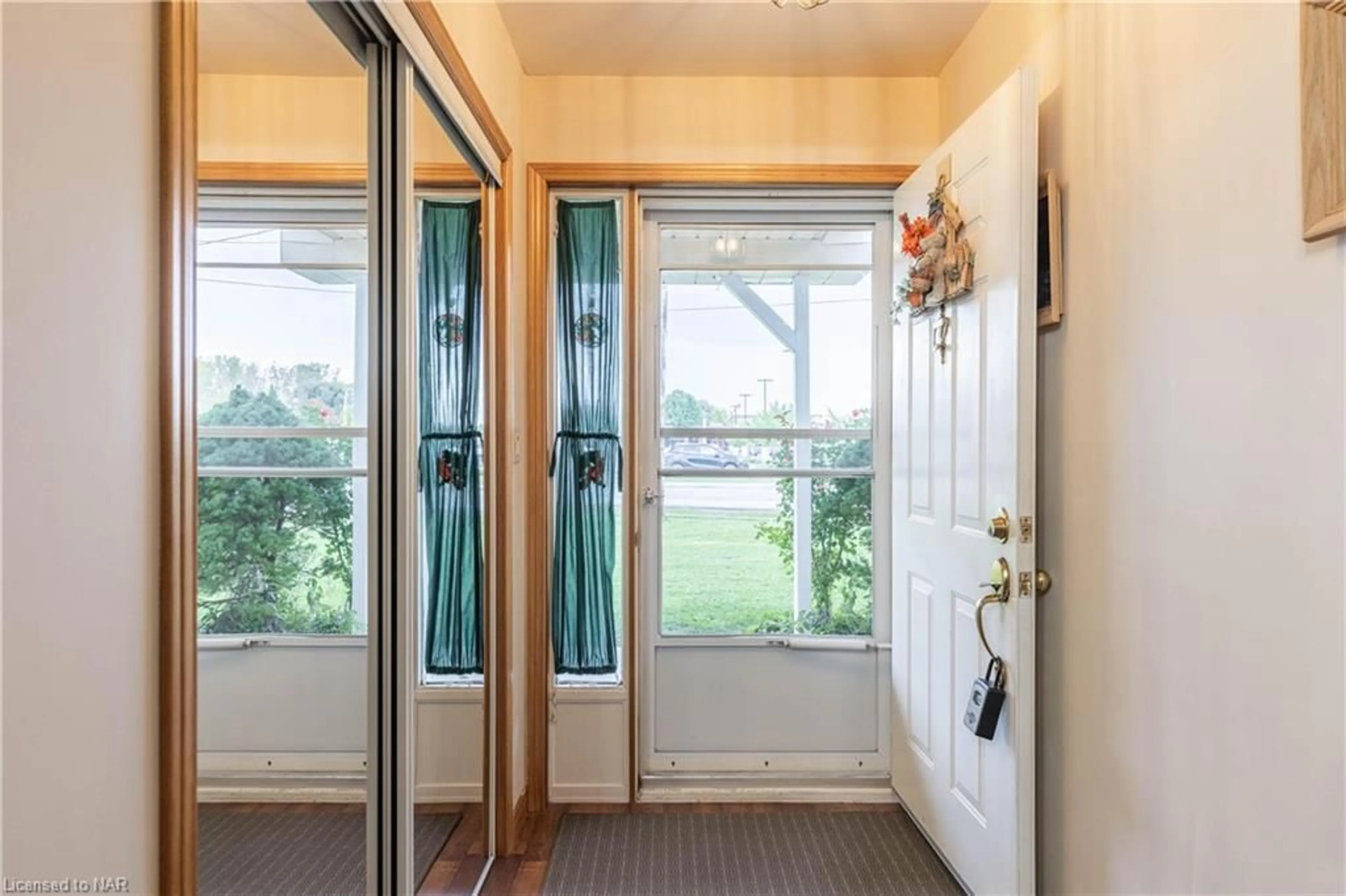 Indoor entryway, wood floors for 8115 Beaverdams Rd, Niagara Falls Ontario L2H 1R9