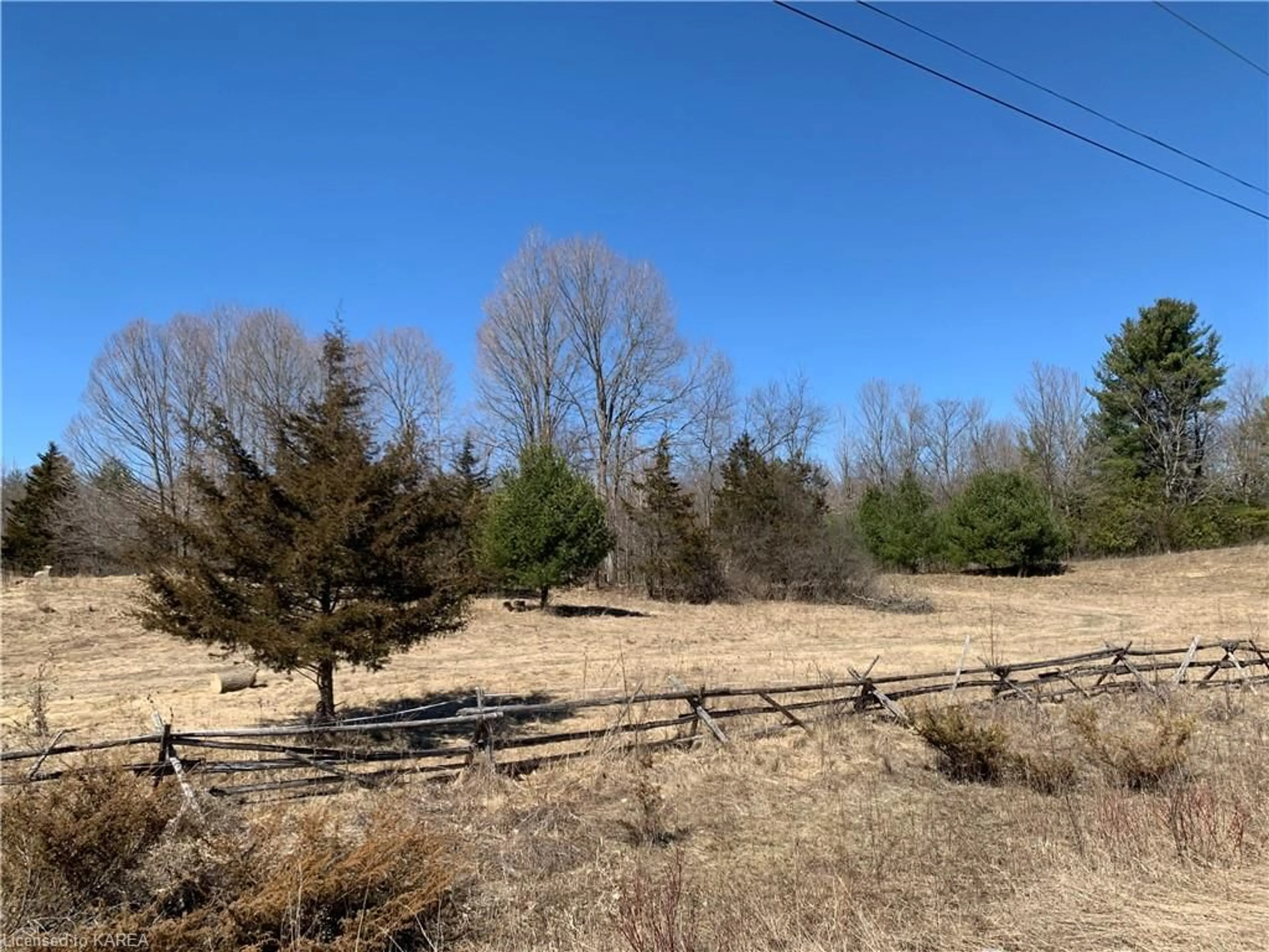 Frontside or backside of a home, the fenced backyard for PT LT 15 (PART  Pine Grove Rd, Greater Napanee Ontario K0K 2L0