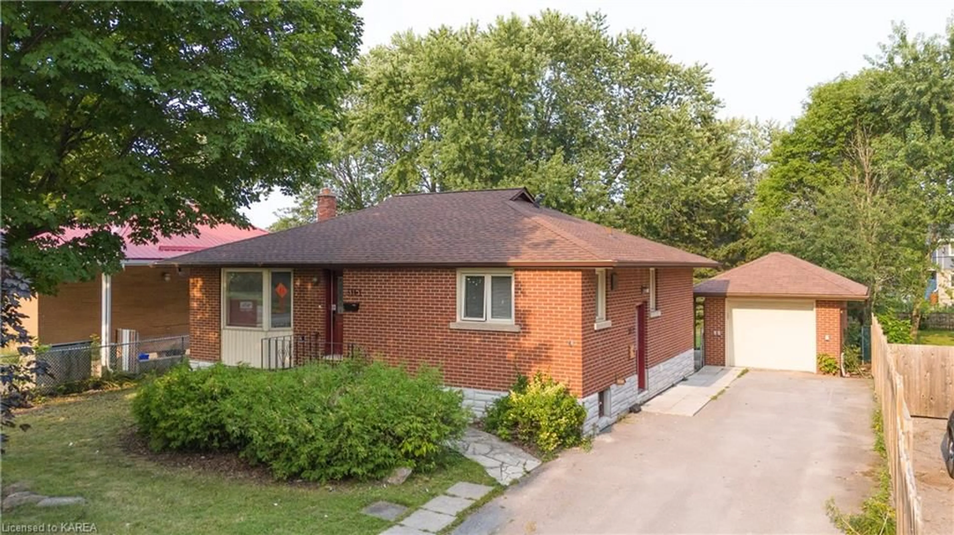 Home with brick exterior material for 311 Portsmouth Ave, Kingston Ontario K7M 1V7