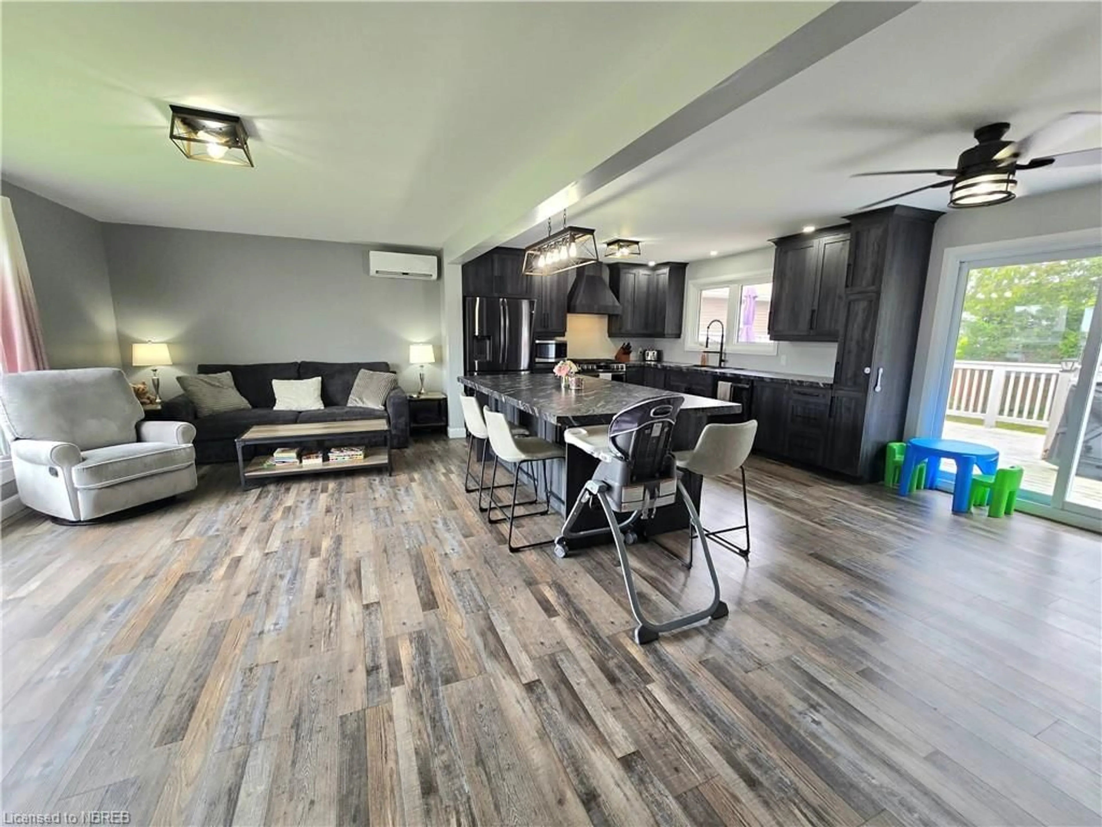 A pic of a room, wood floors for 157 John St, Sturgeon Falls Ontario P2B 1Z7