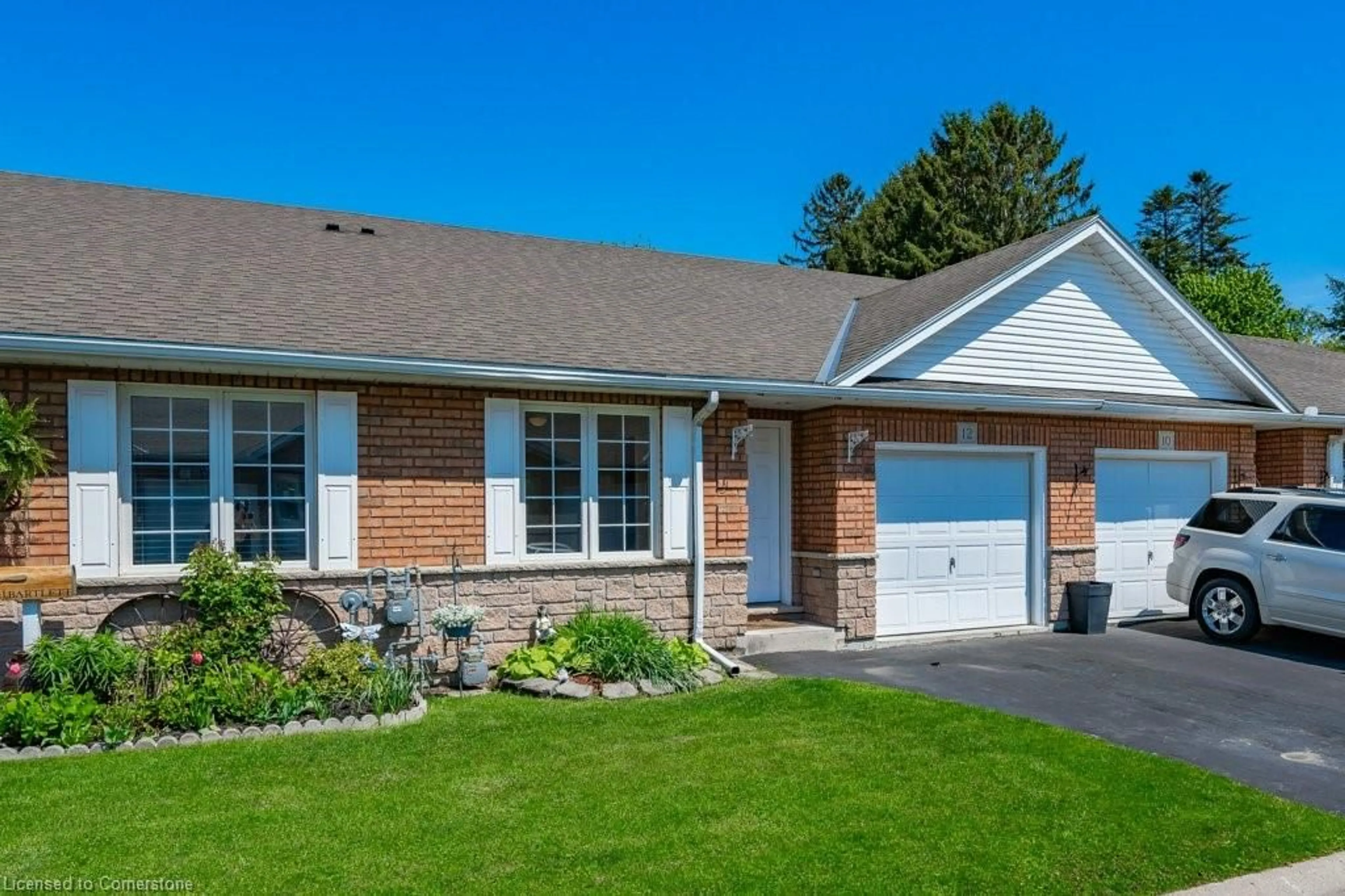 Home with brick exterior material for 12 Clonmel Lane, Port Dover Ontario N0A 1N1