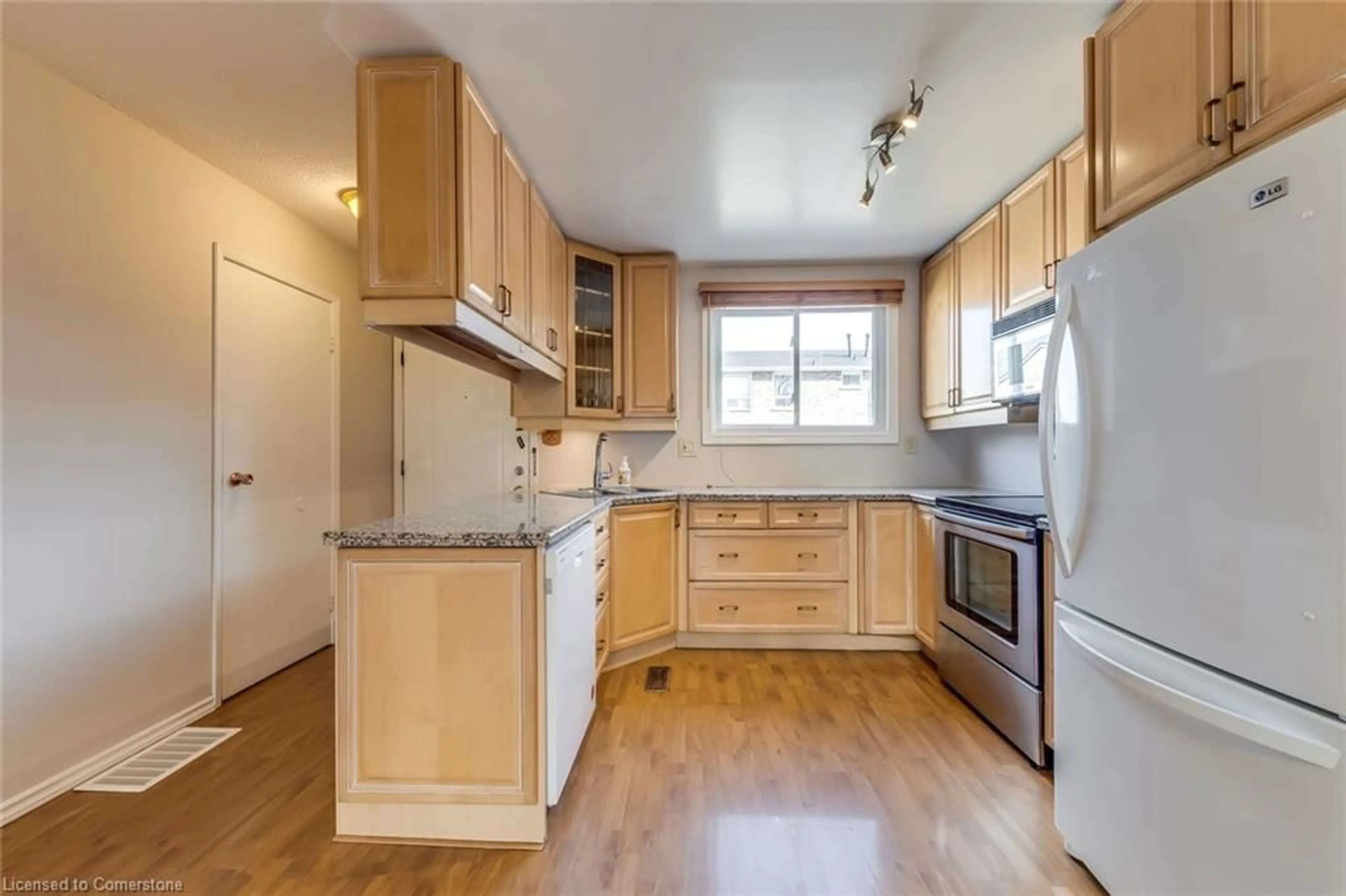 Standard kitchen, wood floors, cottage for 120 Quigley Rd #69, Hamilton Ontario L8K 6L4