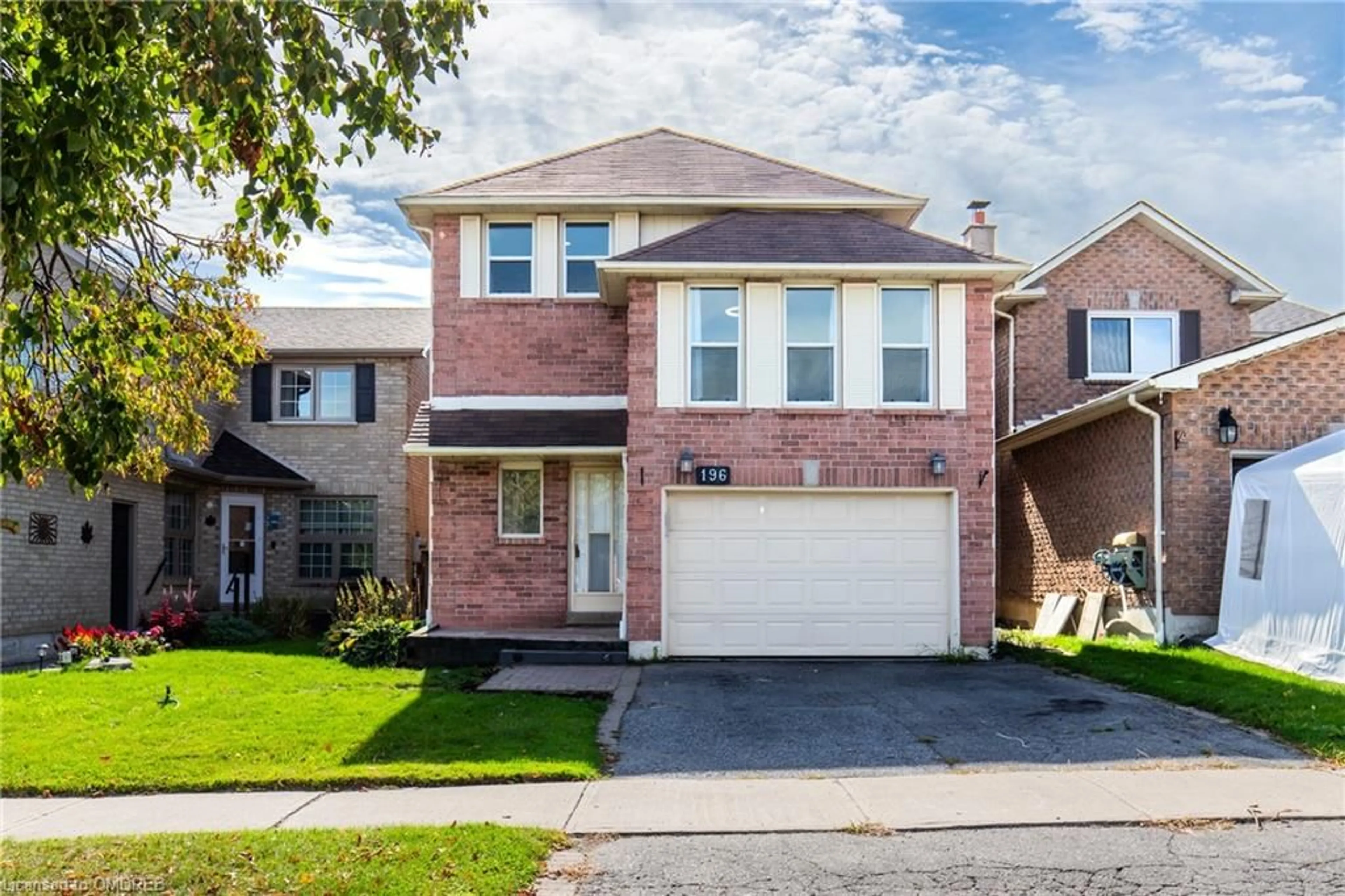 Frontside or backside of a home, the street view for 196 Delaney Dr, Ajax Ontario L1T 2B5