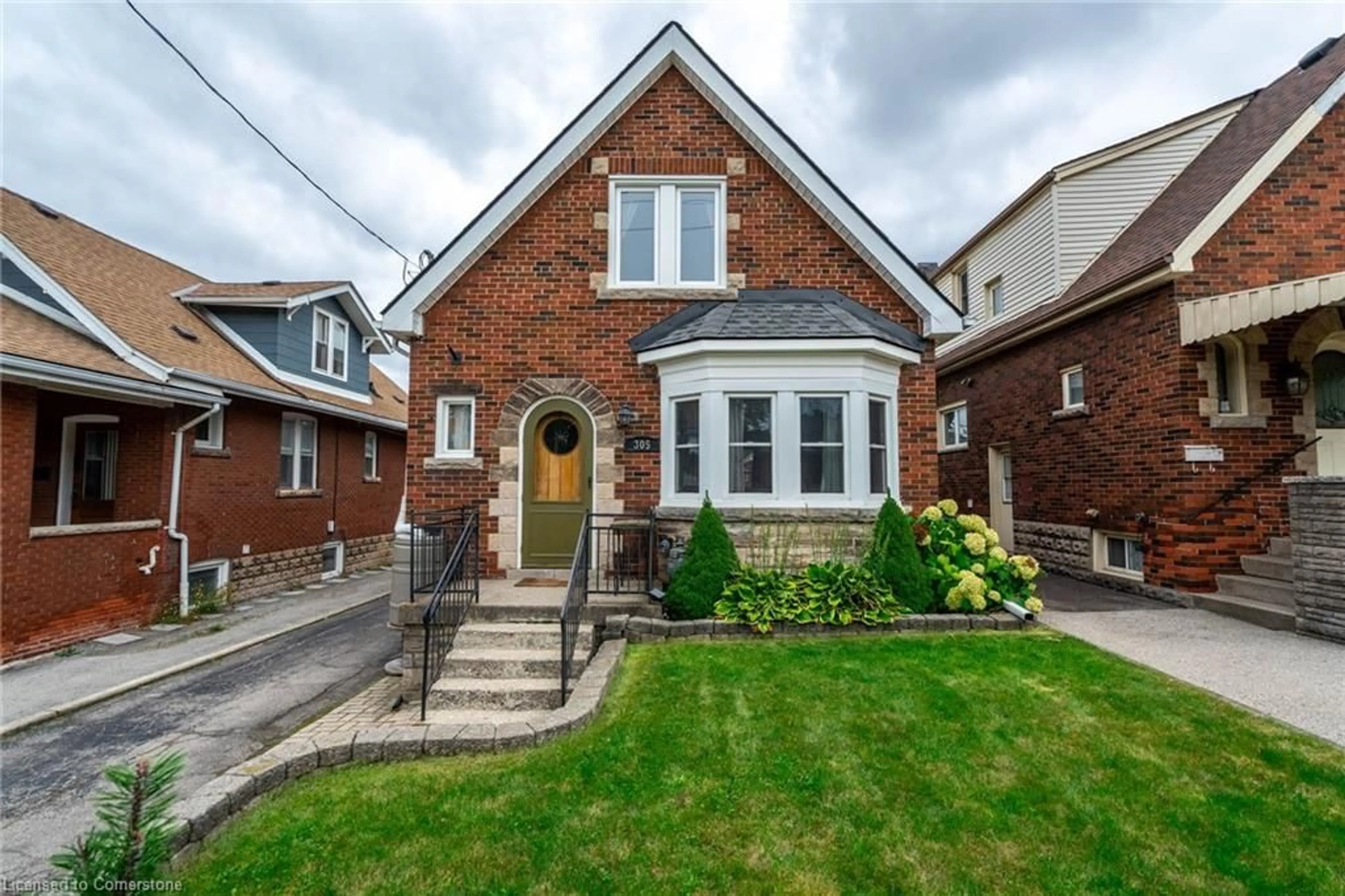 Home with brick exterior material for 305 Wexford Ave, Hamilton Ontario L8K 2P4