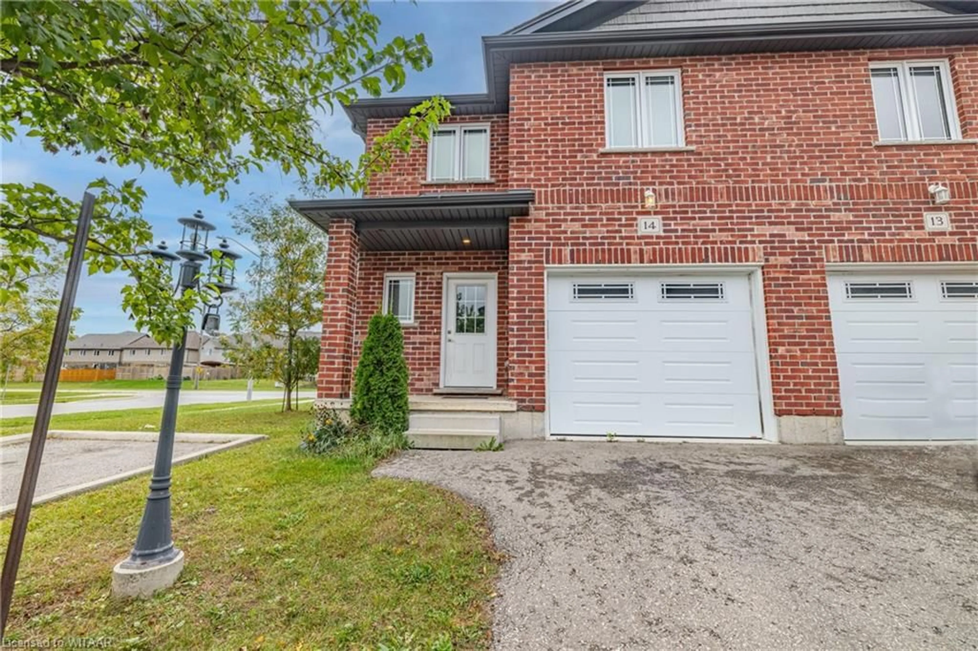 Home with brick exterior material for 292 Falcon Dr #14, Woodstock Ontario N4T 0C1