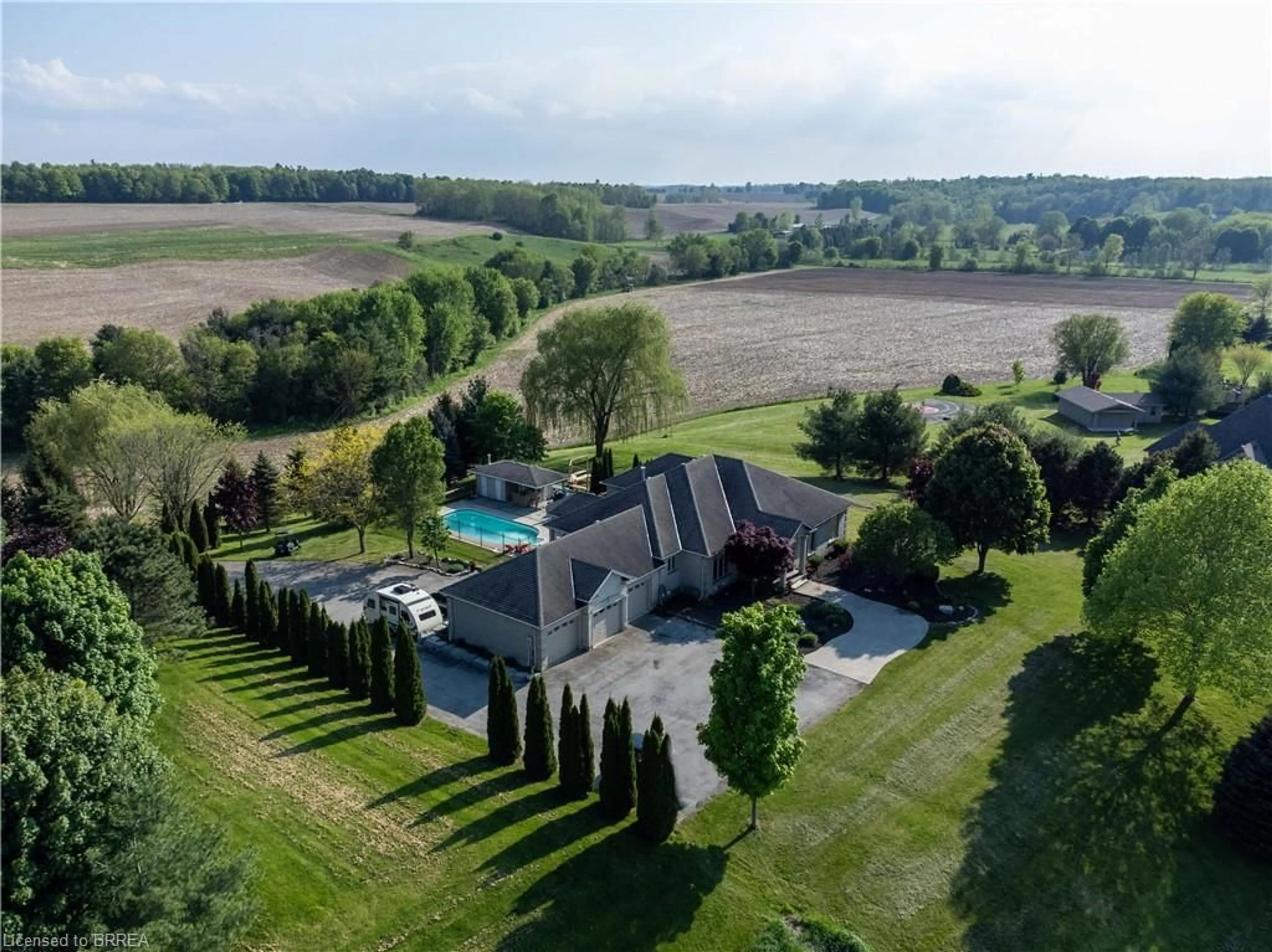 Frontside or backside of a home, the fenced backyard for 95 St George Rd, Paris Ontario N3L 3E1