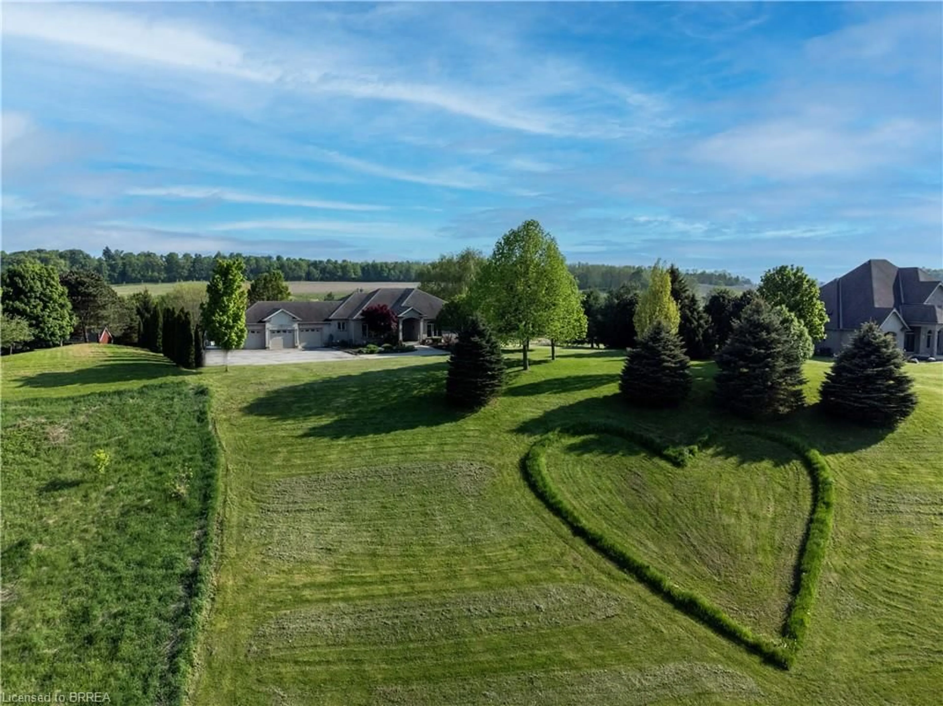 A pic from exterior of the house or condo, the fenced backyard for 95 St George Rd, Paris Ontario N3L 3E1