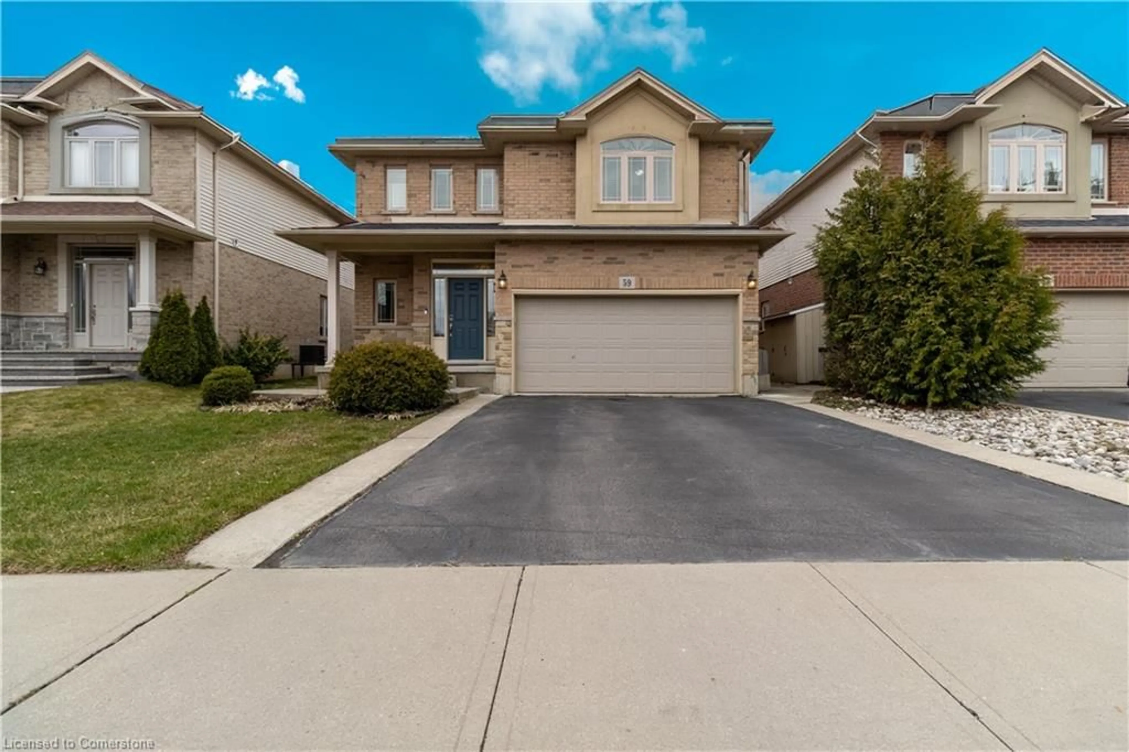 Frontside or backside of a home, the street view for 59 Kopperfield Lane, Mount Hope Ontario L0R 1W0