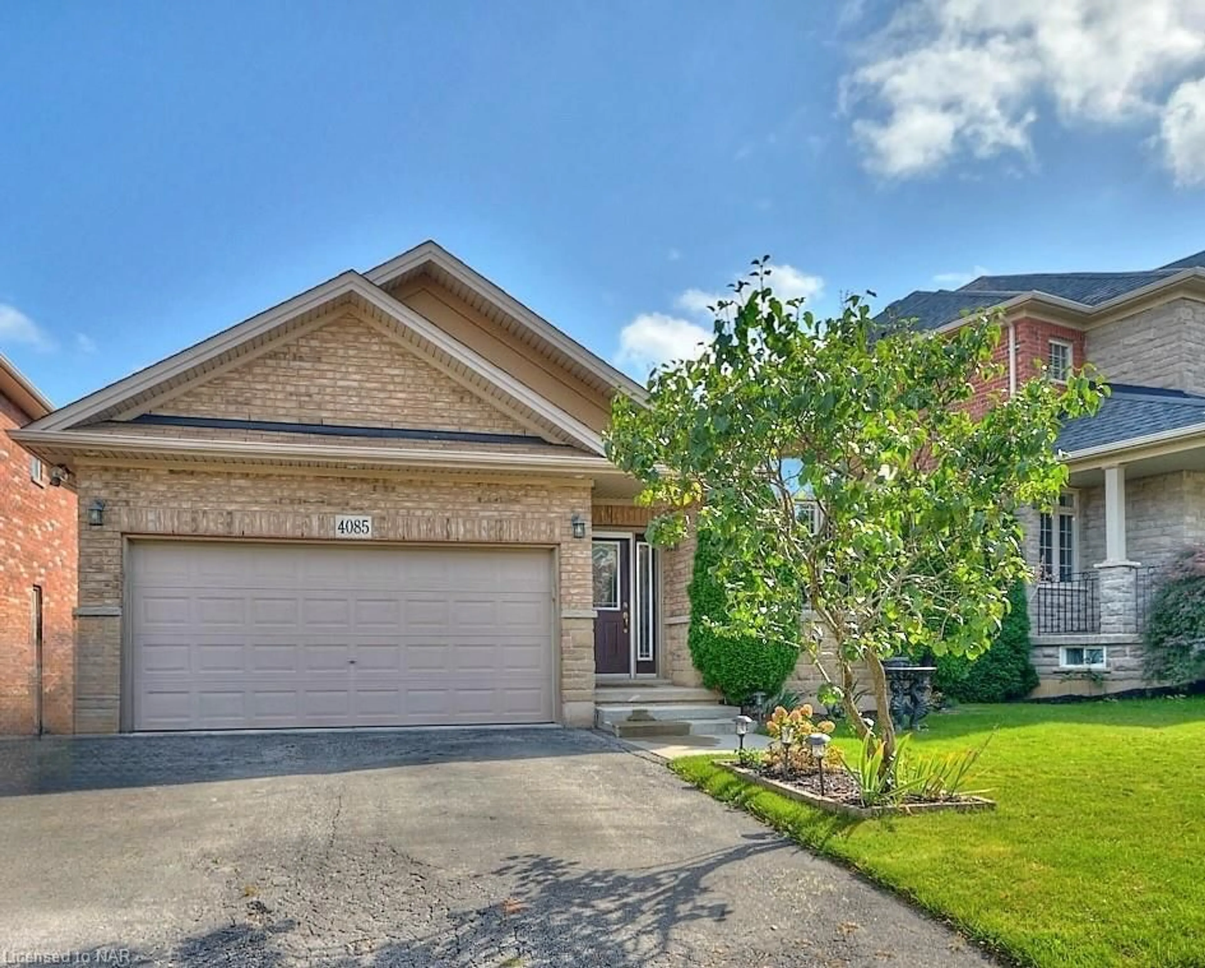 Frontside or backside of a home, cottage for 4085 Highland Park Dr, Beamsville Ontario L0R 1B7