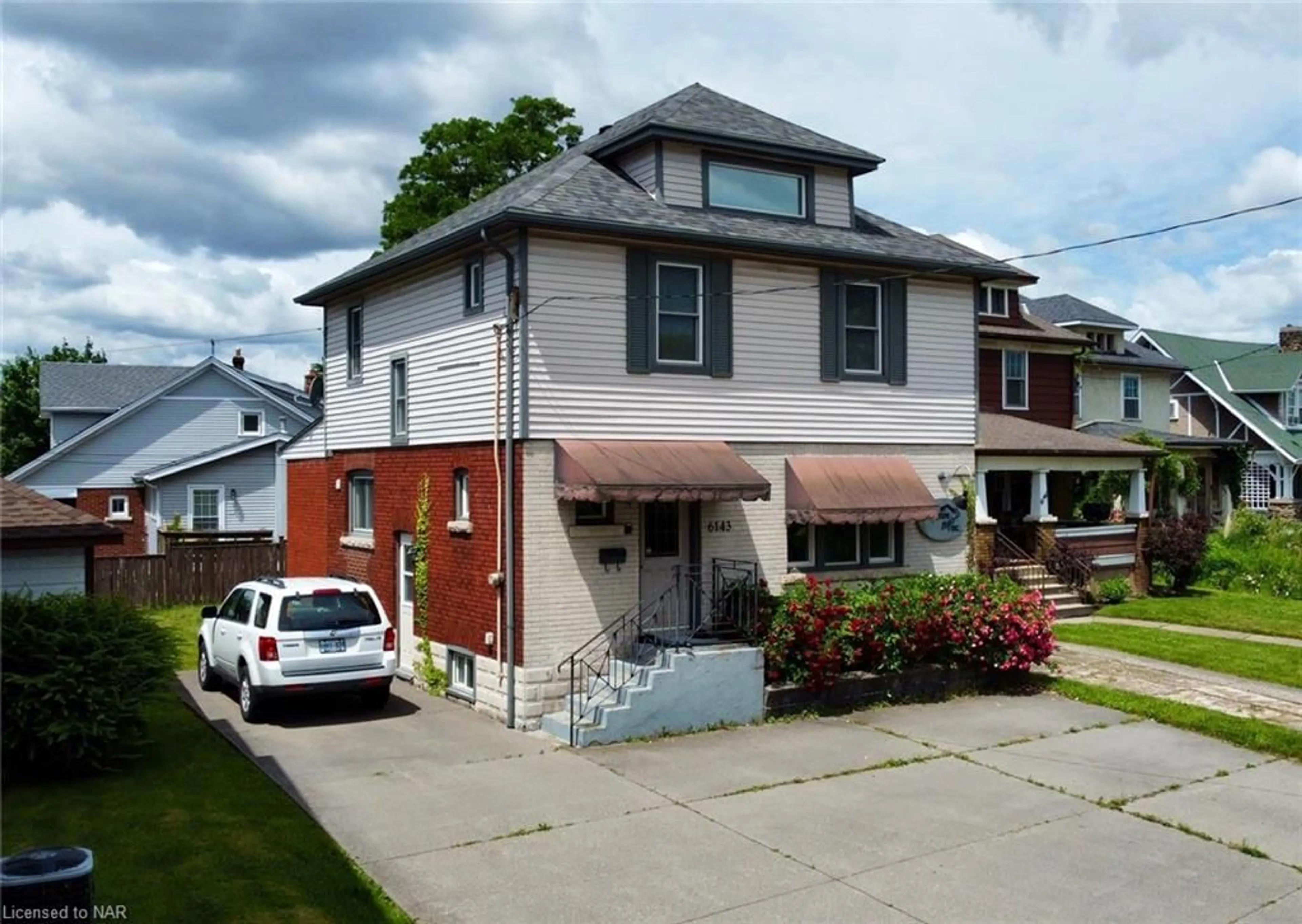 Frontside or backside of a home, the street view for 6143 Main St, Niagara Falls Ontario L2G 6A2