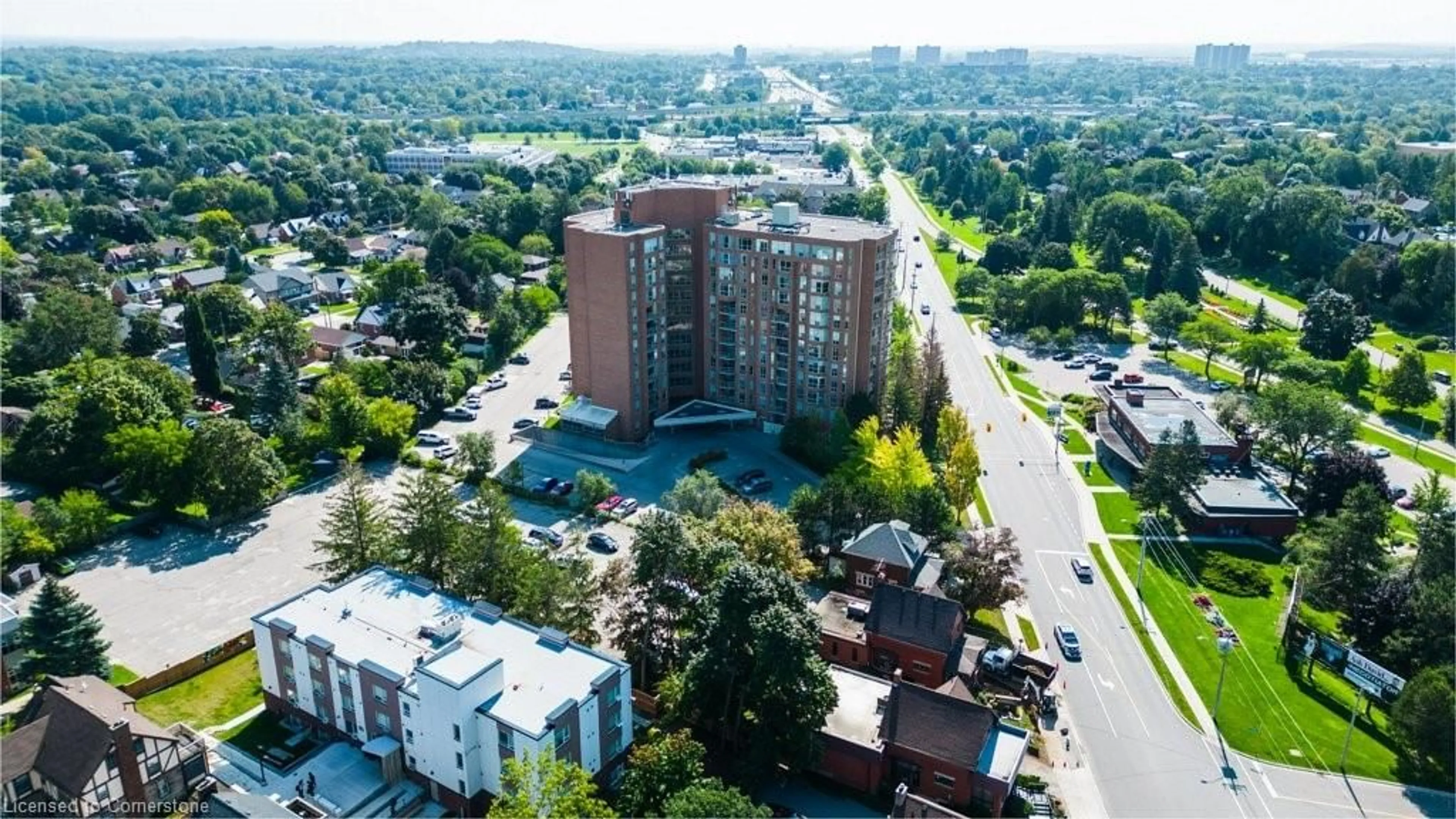 A pic from exterior of the house or condo, the view of city buildings for 1414 King St #202, Kitchener Ontario N2G 4T8