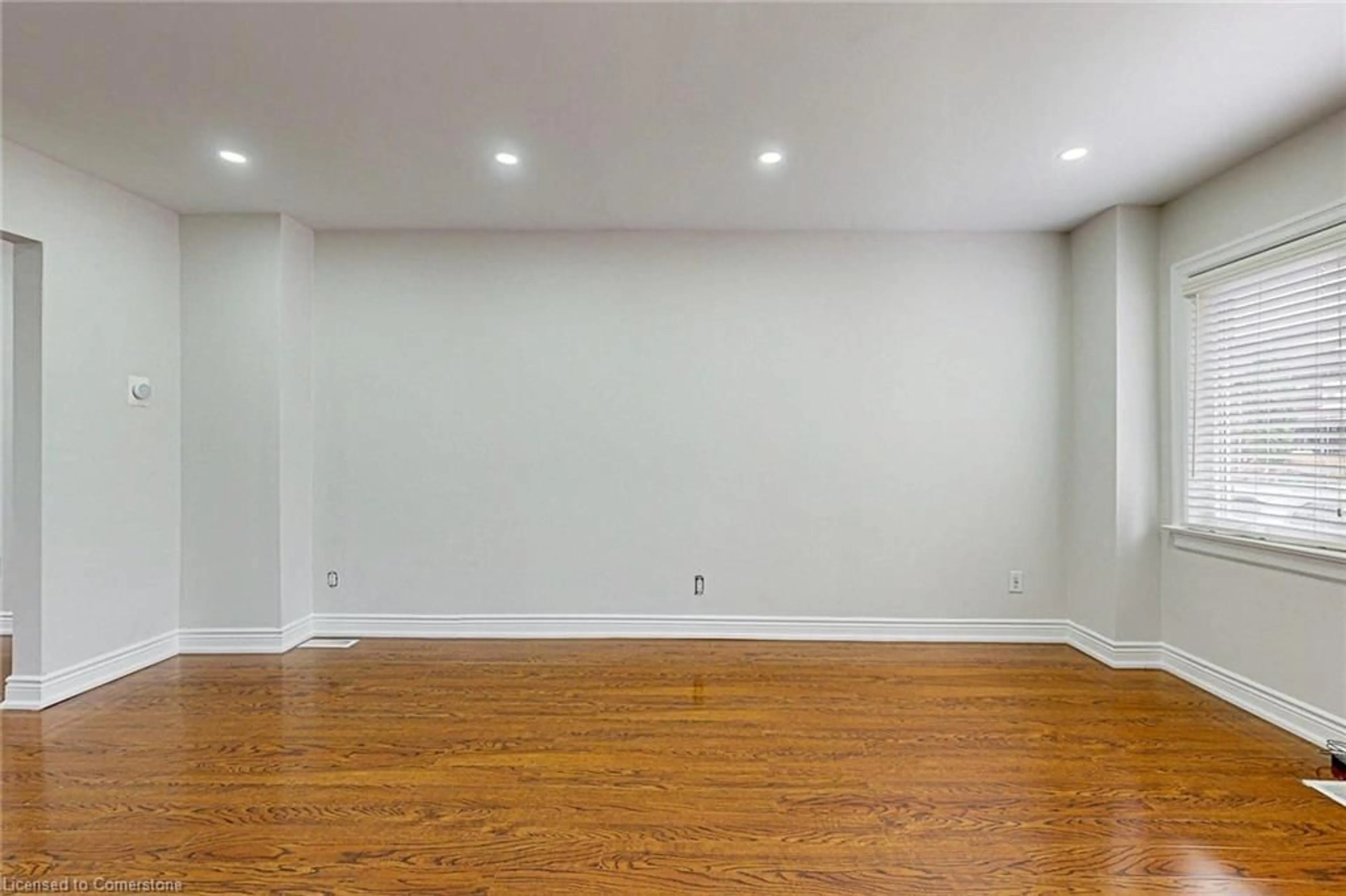 A pic of a room, wood floors for 192 Wentworth St, Hamilton Ontario L8N 2Z4