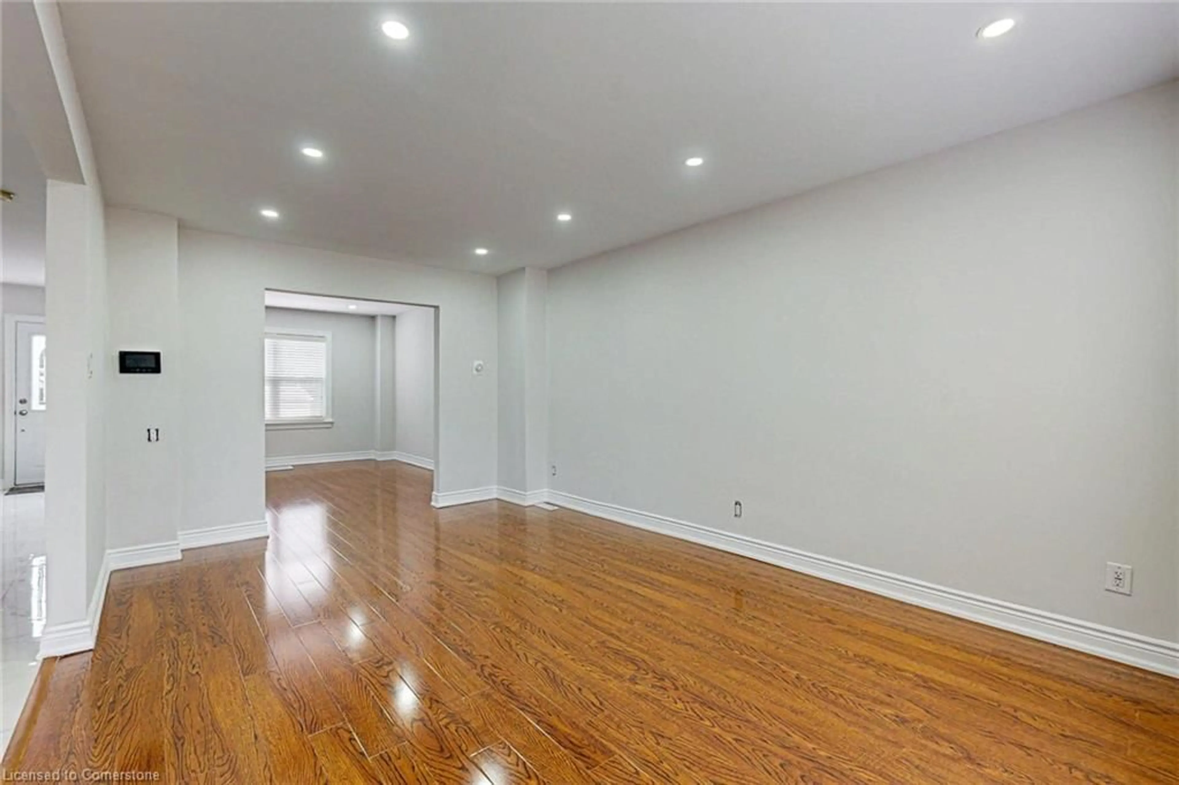 A pic of a room, wood floors for 192 Wentworth St, Hamilton Ontario L8N 2Z4