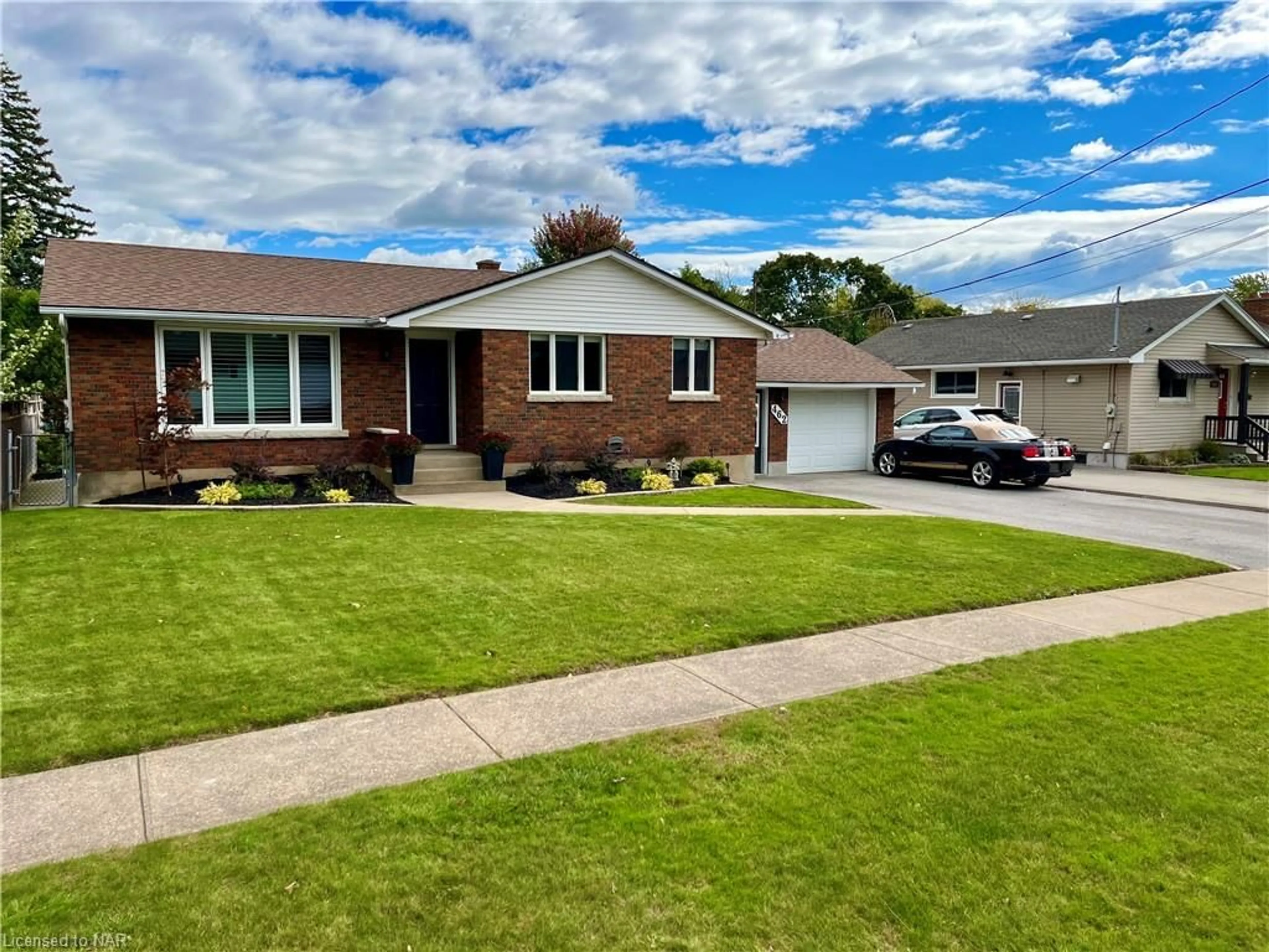 Frontside or backside of a home, the street view for 462 Grantham Ave, St. Catharines Ontario L2M 3J4