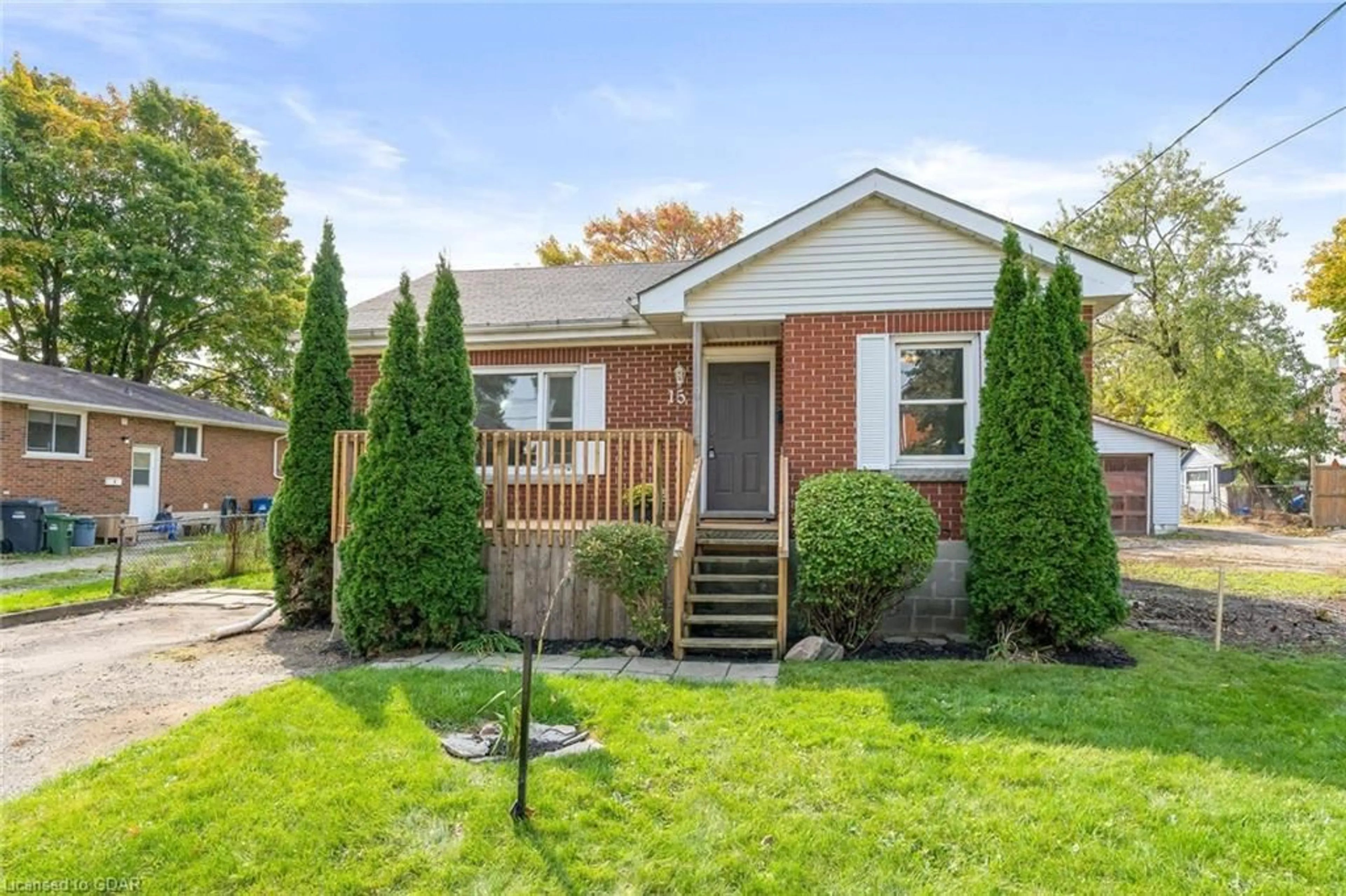 Frontside or backside of a home for 15 Lawrence Ave, Guelph Ontario N1E 5Y4