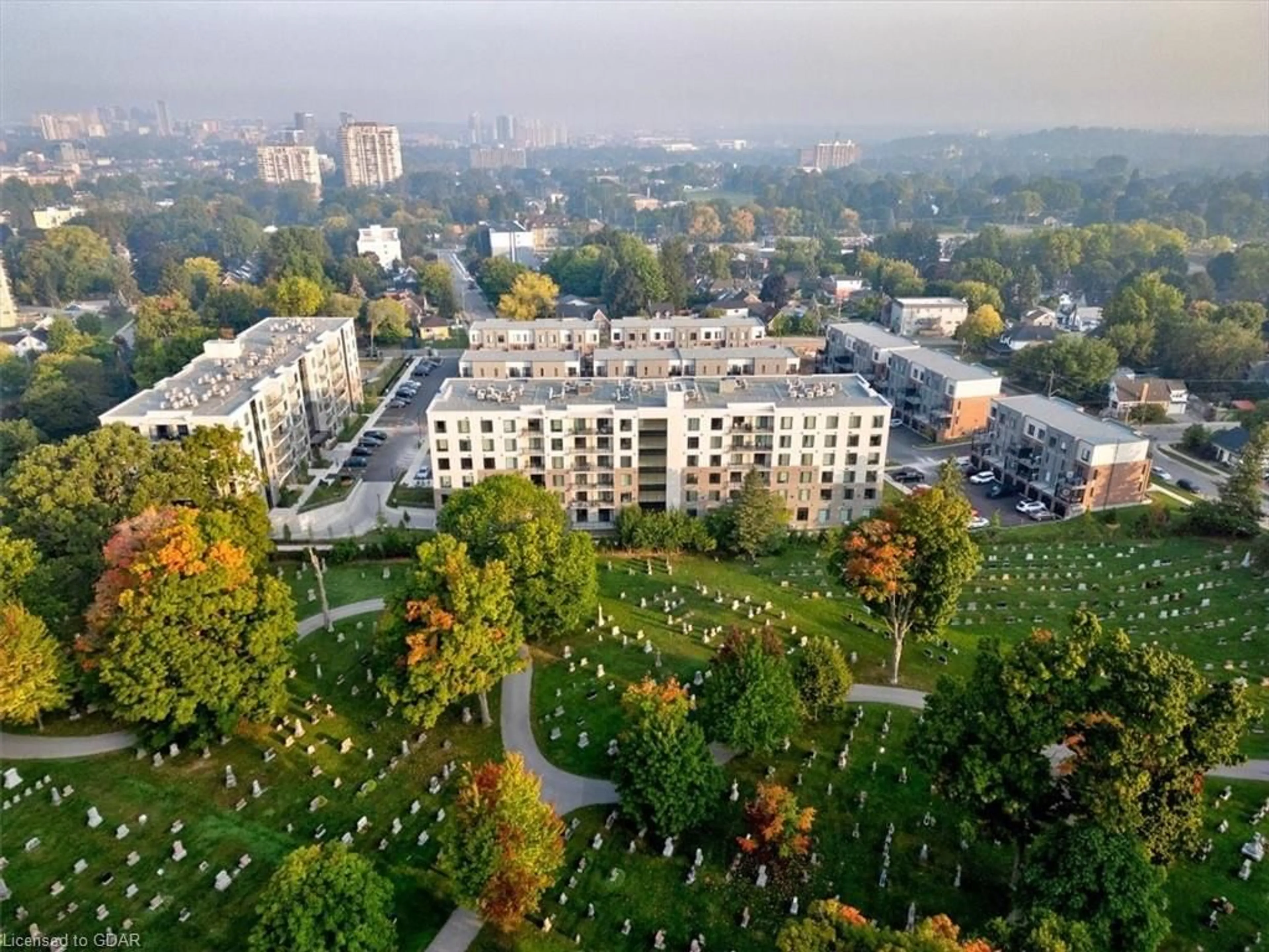 A pic from exterior of the house or condo, the view of city buildings for 107 Roger St #215, Waterloo Ontario N2J 0G3