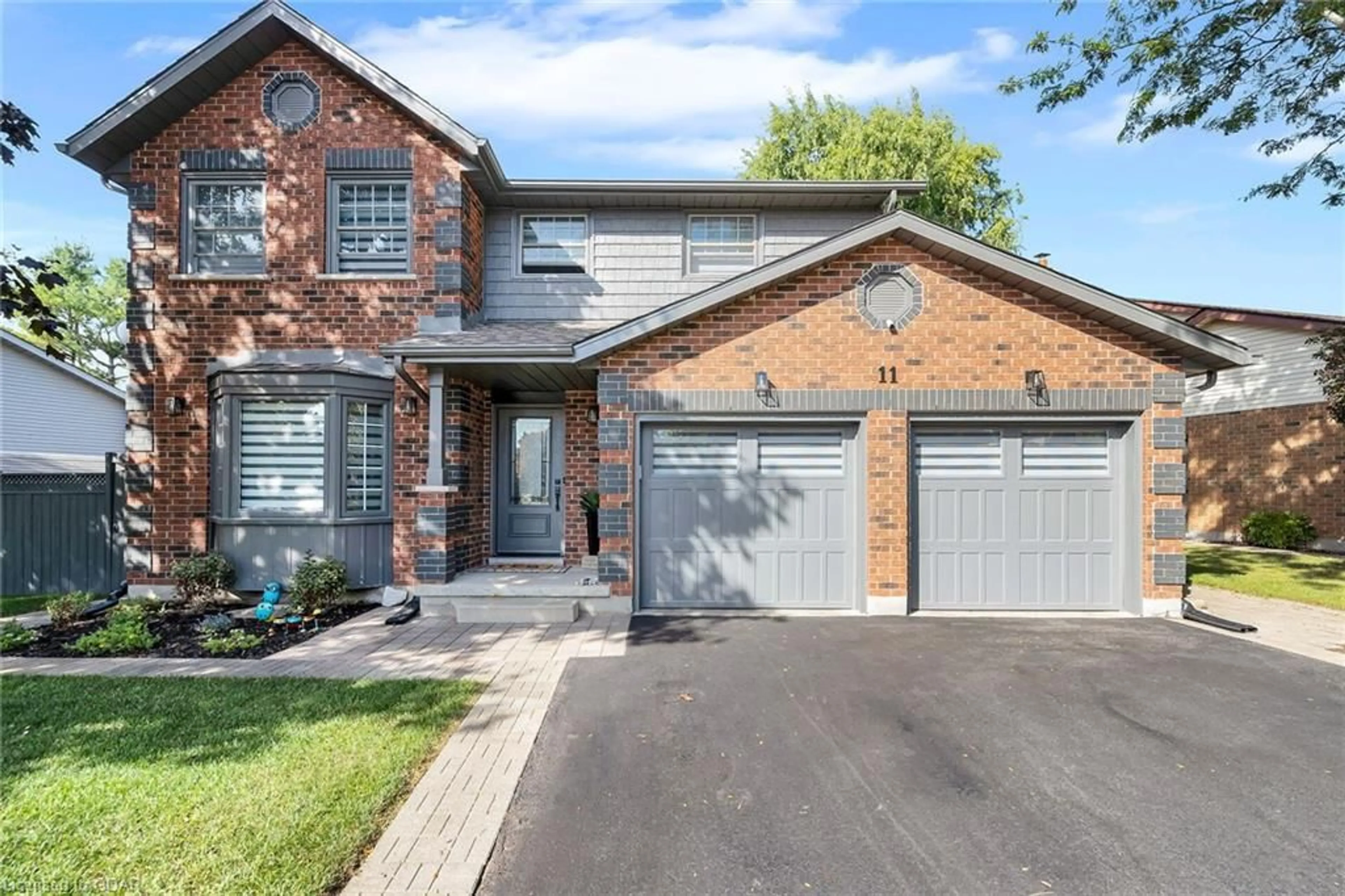 Home with brick exterior material for 11 Tanager Dr, Guelph Ontario N1C 1A5