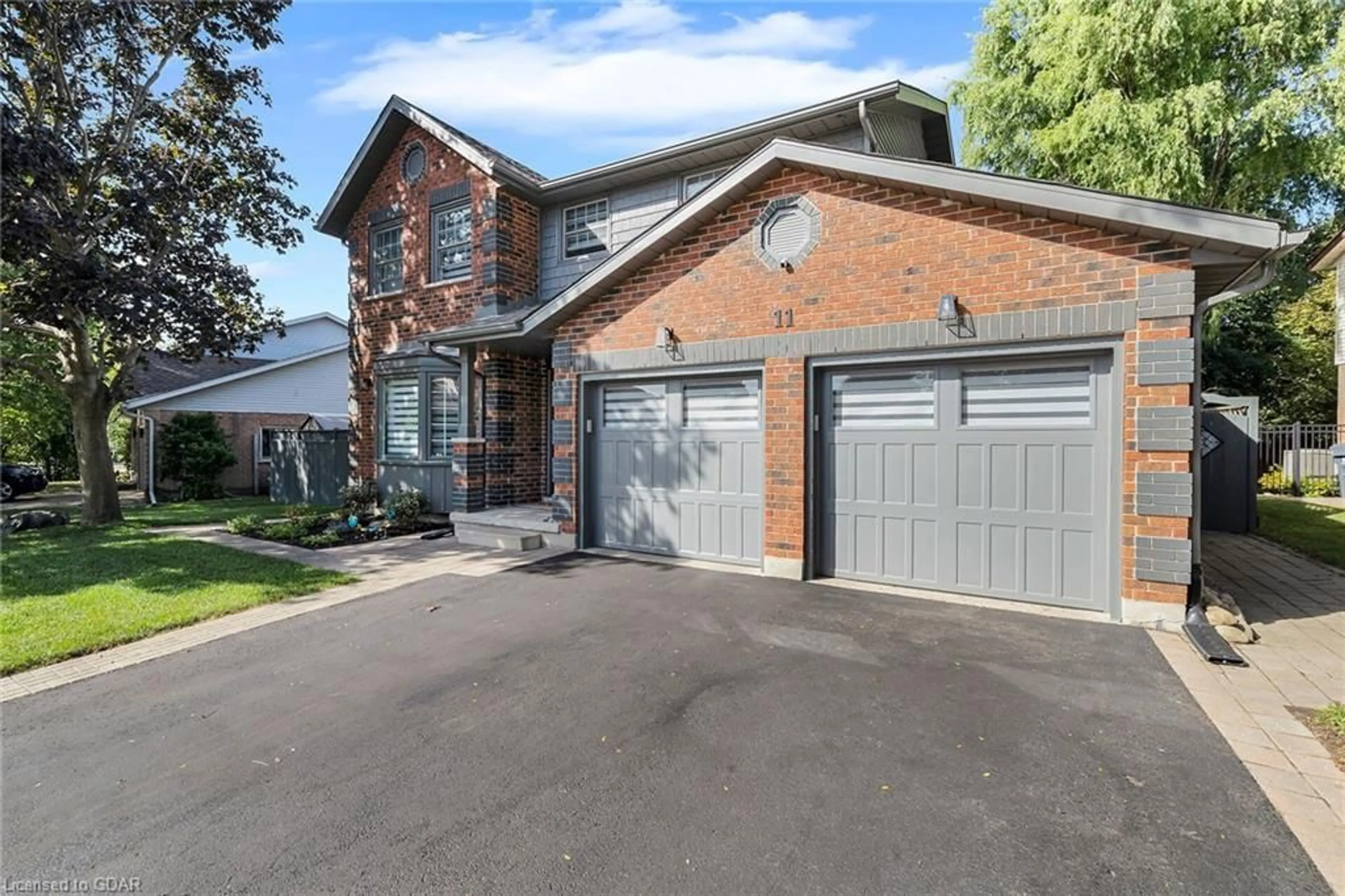 Home with brick exterior material for 11 Tanager Dr, Guelph Ontario N1C 1A5