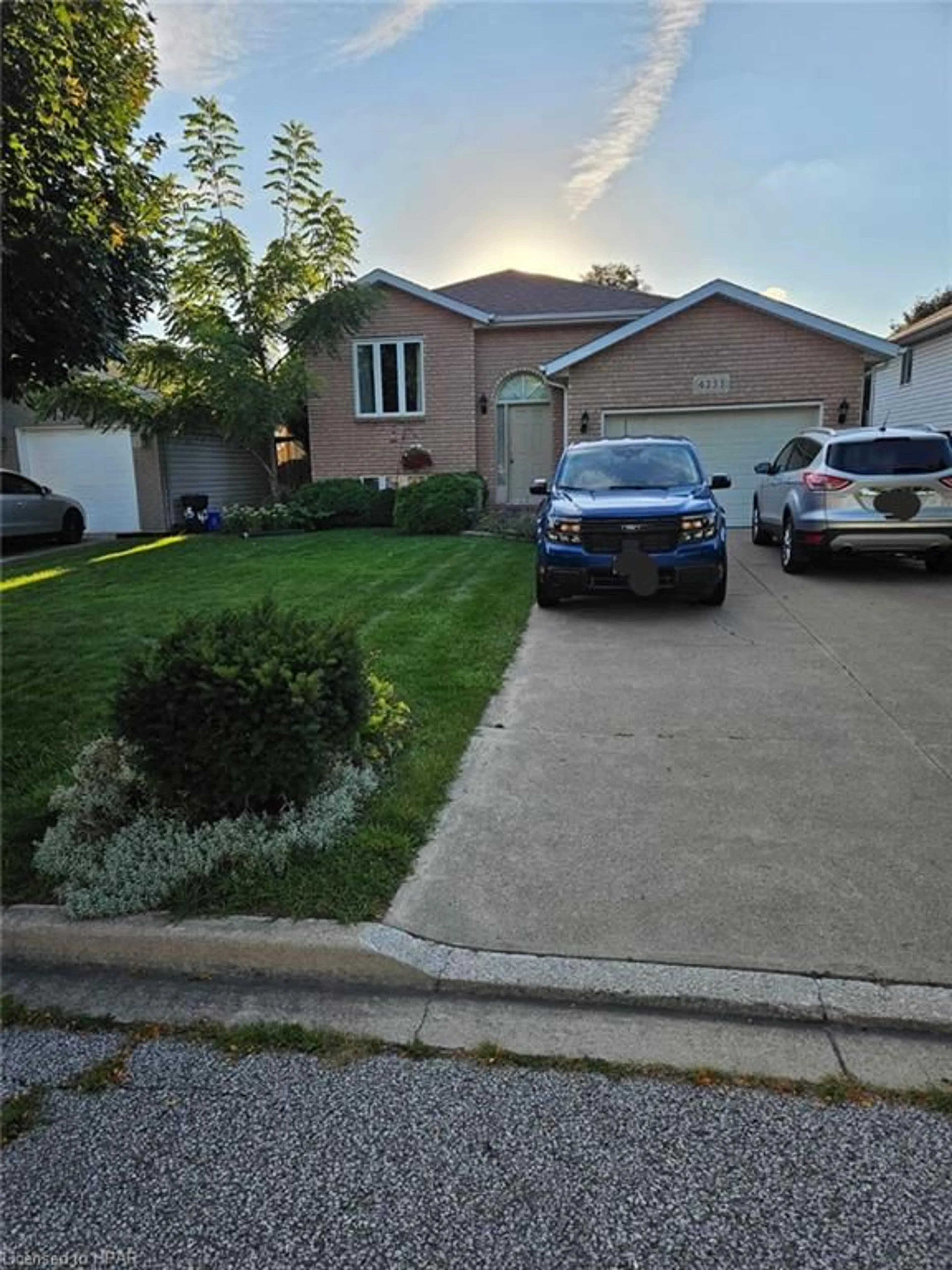 Frontside or backside of a home, the street view for 4233 Northwood Lakes Dr, Windsor Ontario N9G 2W2