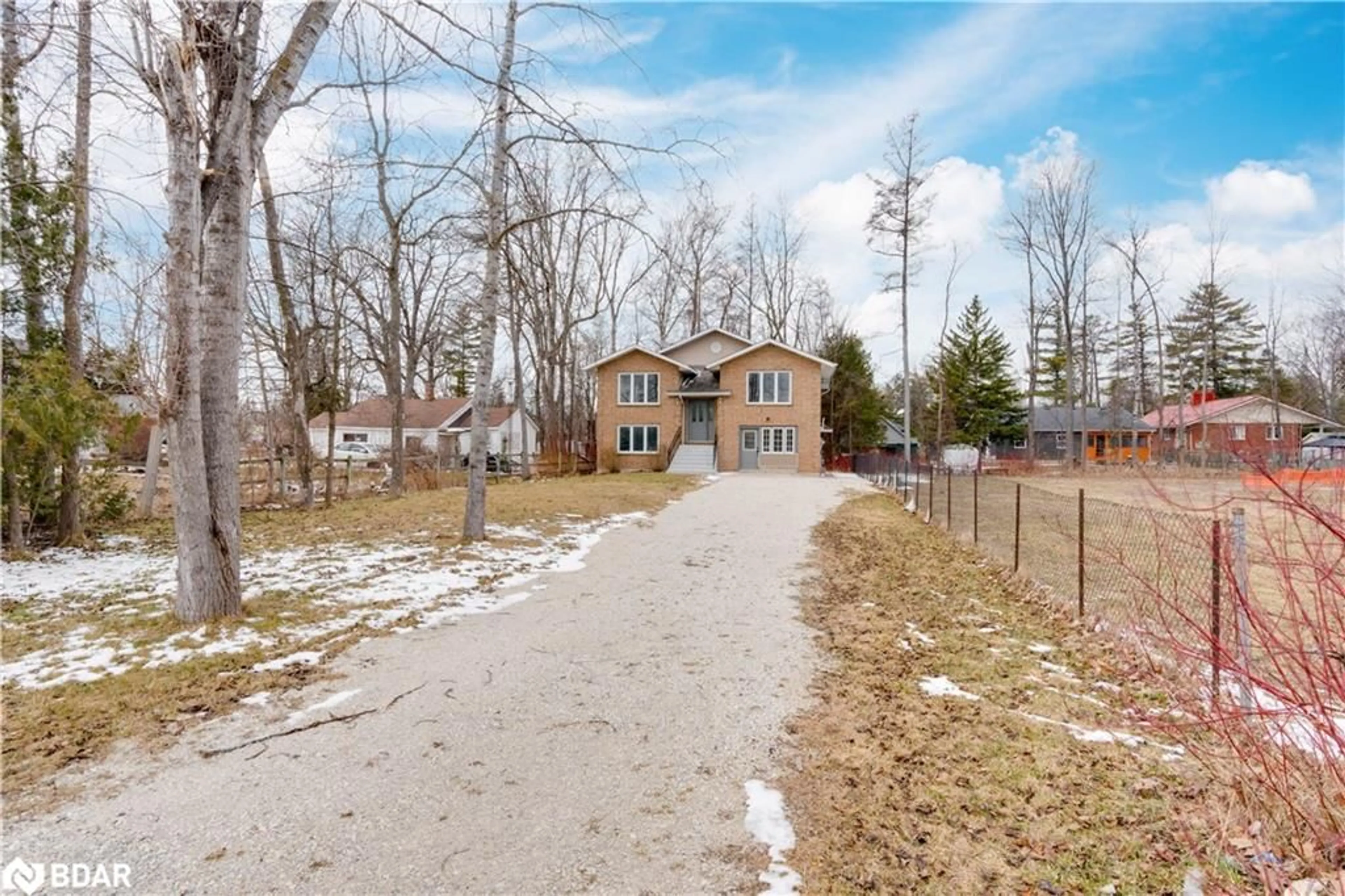 A pic from exterior of the house or condo, the fenced backyard for 138 45th St, Wasaga Beach Ontario L9Z 1Z2