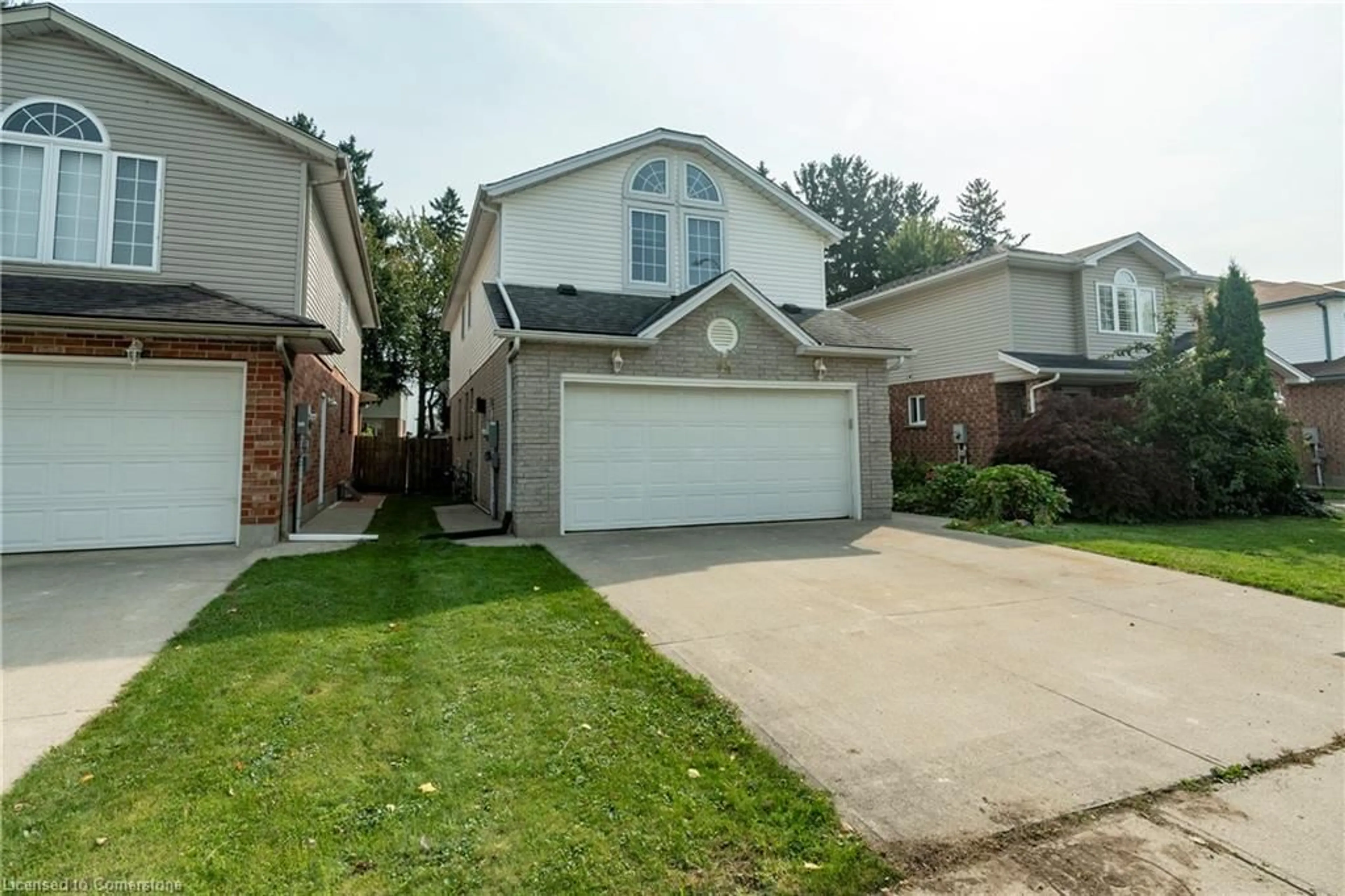 Frontside or backside of a home, the street view for 94 Queen Charlotte Cres, Kitchener Ontario N2E 3N6