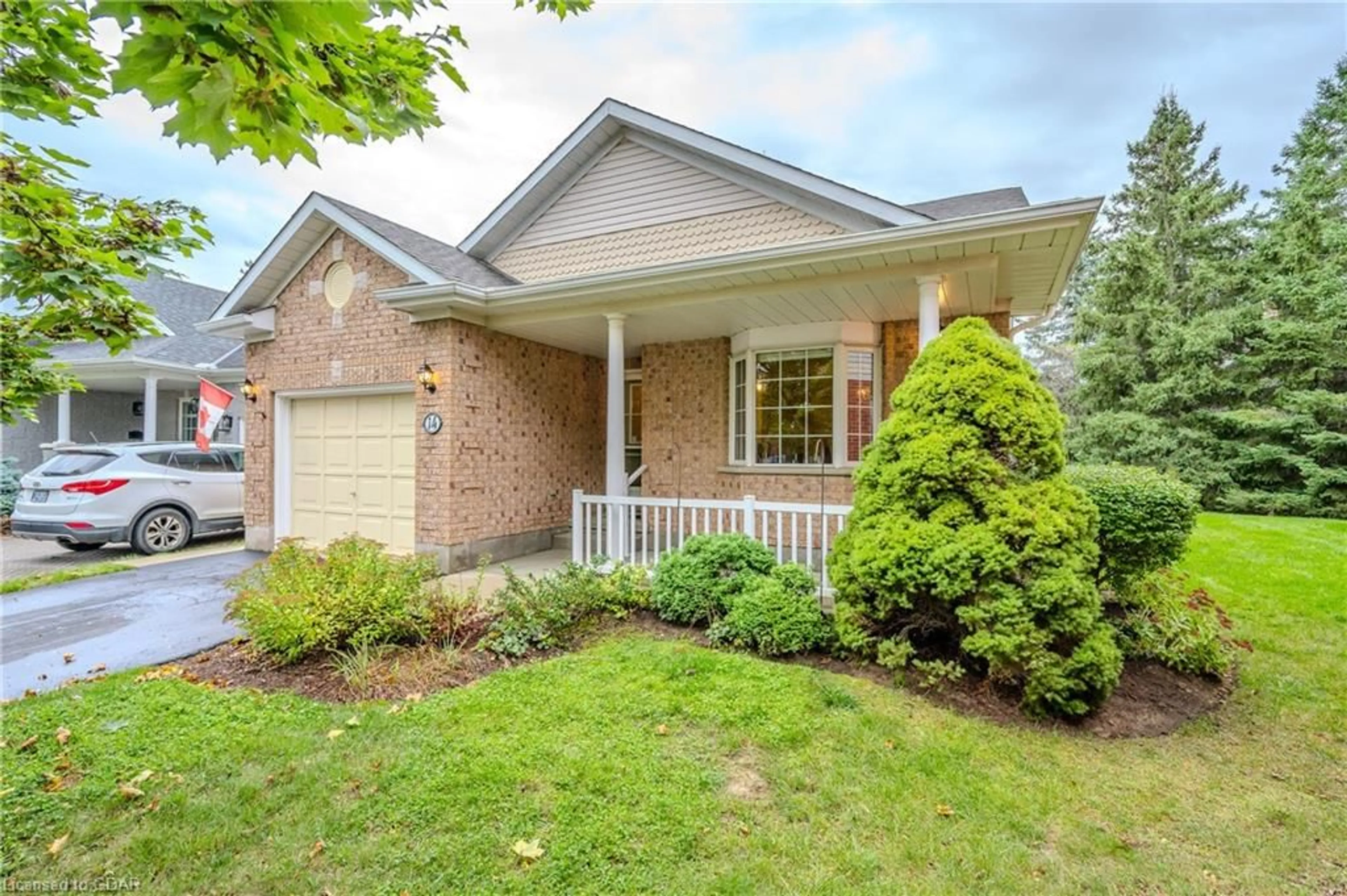 Home with brick exterior material for 14 Sprucehaven Crt, Guelph Ontario N1G 4X7