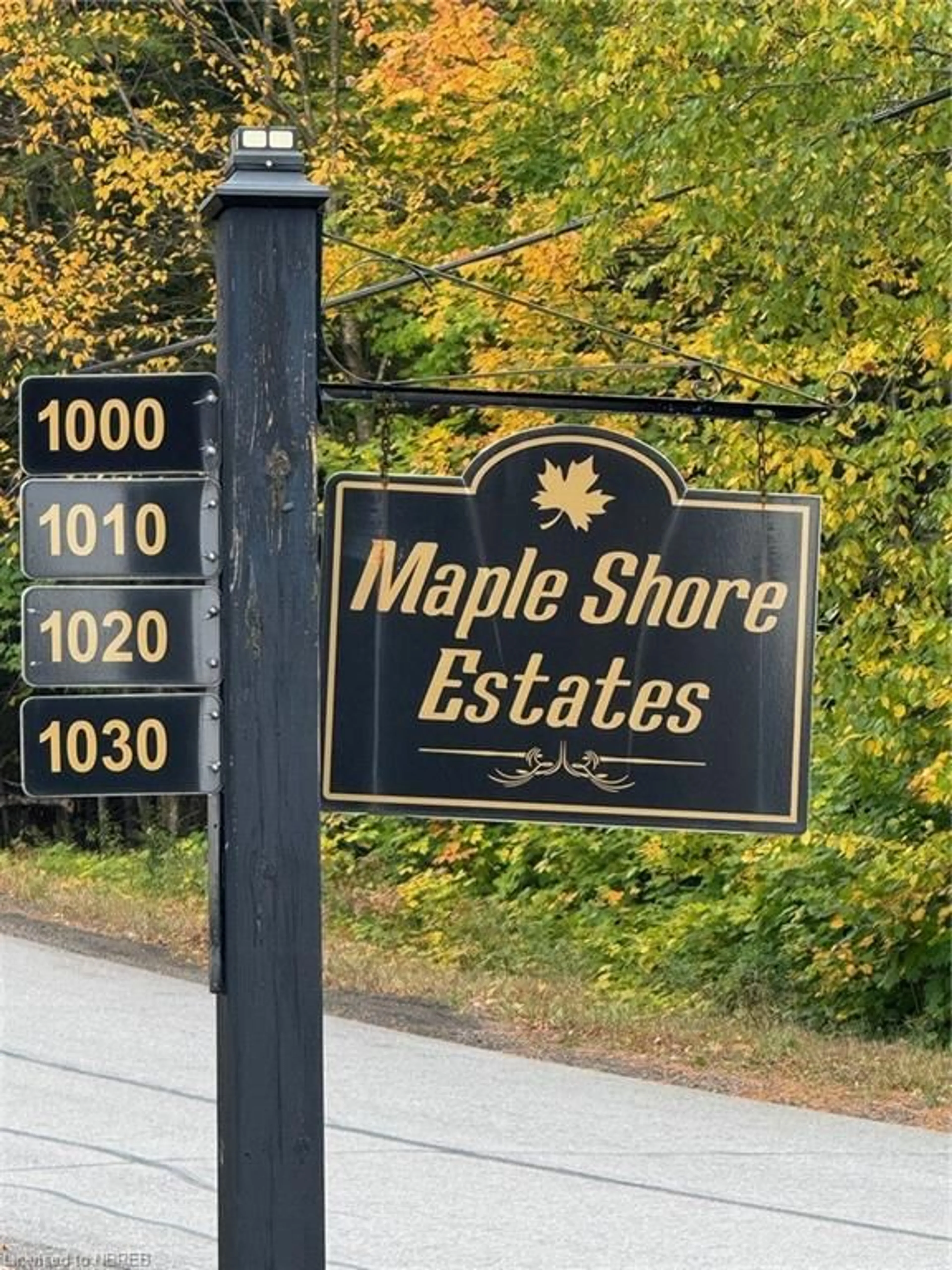 A pic from exterior of the house or condo, the street view for 1010 Four Mile Lake Rd, North Bay Ontario P1B 8G2