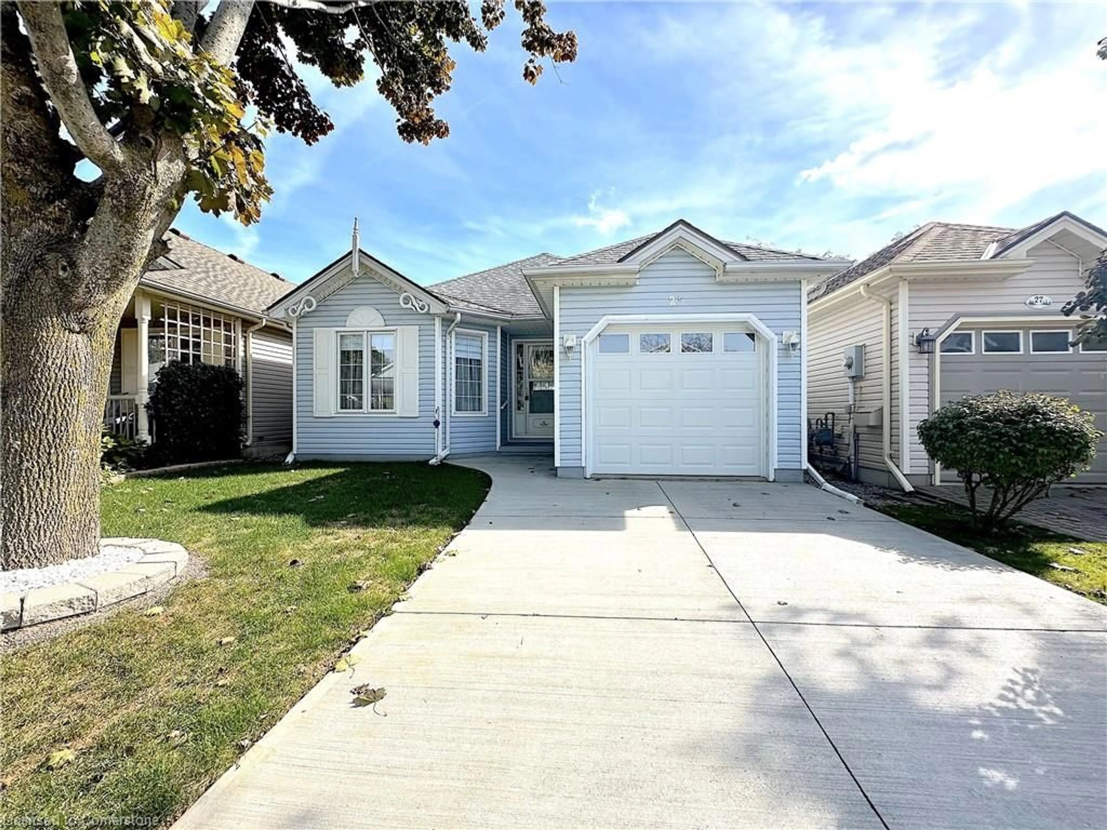 Frontside or backside of a home, the street view for 25 Aspen Lane, Port Rowan Ontario N0E 1M0