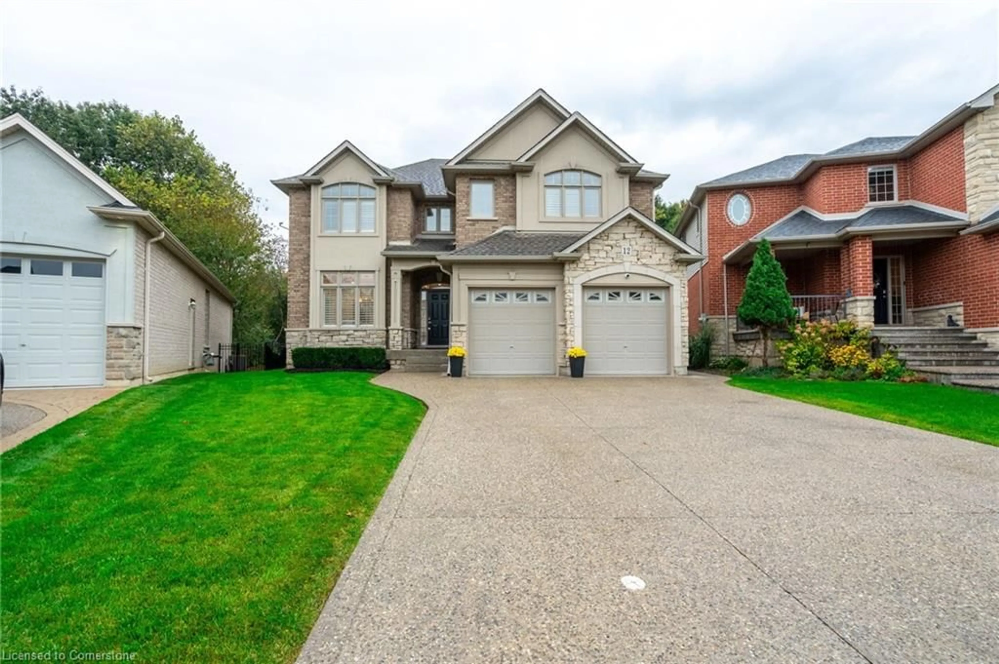 Frontside or backside of a home, the street view for 12 Cowper Crt, Dundas Ontario L9H 7T3