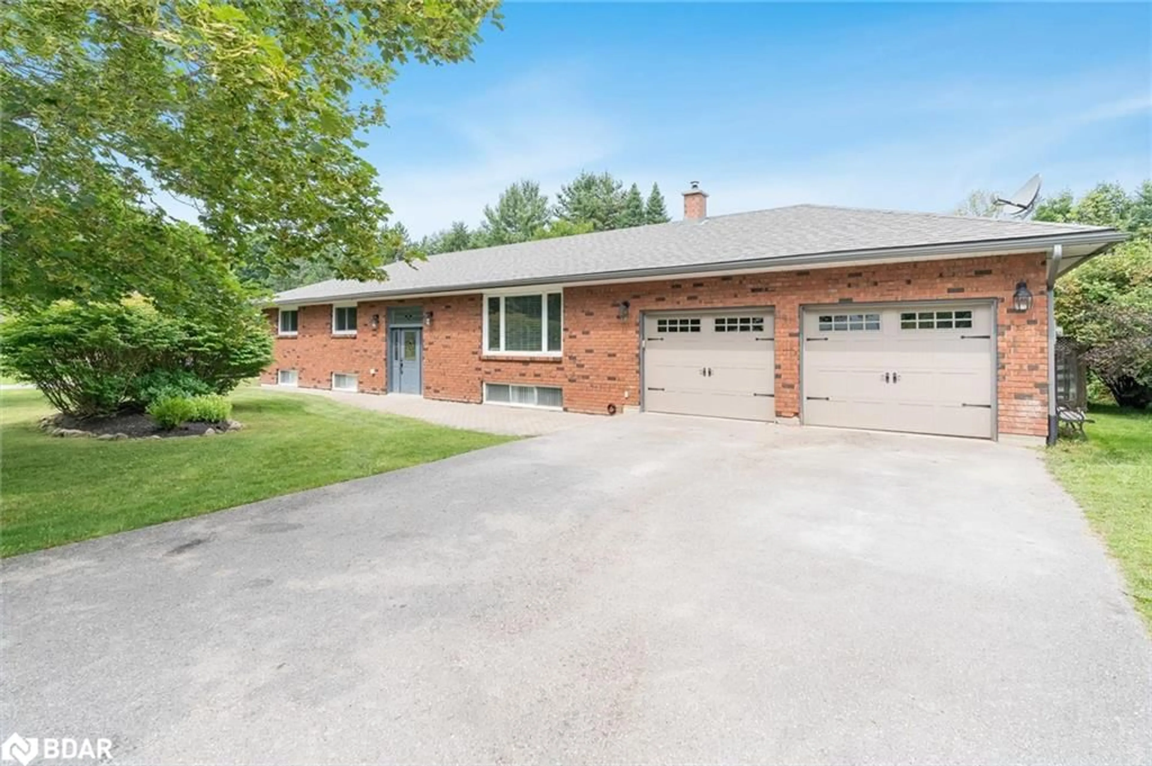 Home with brick exterior material for 220 Moonstone Rd, Moonstone Ontario L0K 1N0