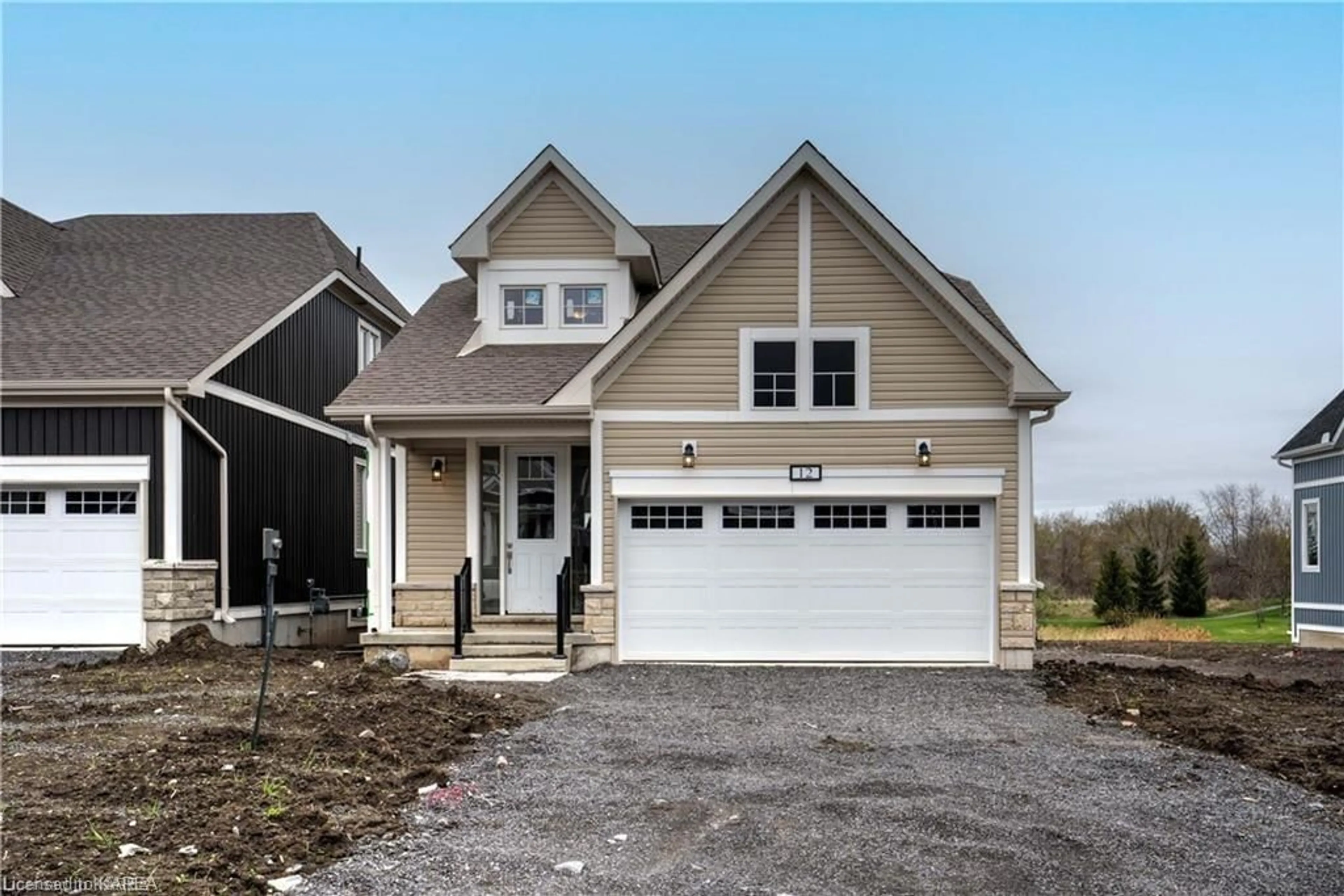 Frontside or backside of a home for 12 Oakmont Dr, Bath Ontario K0H 1G0