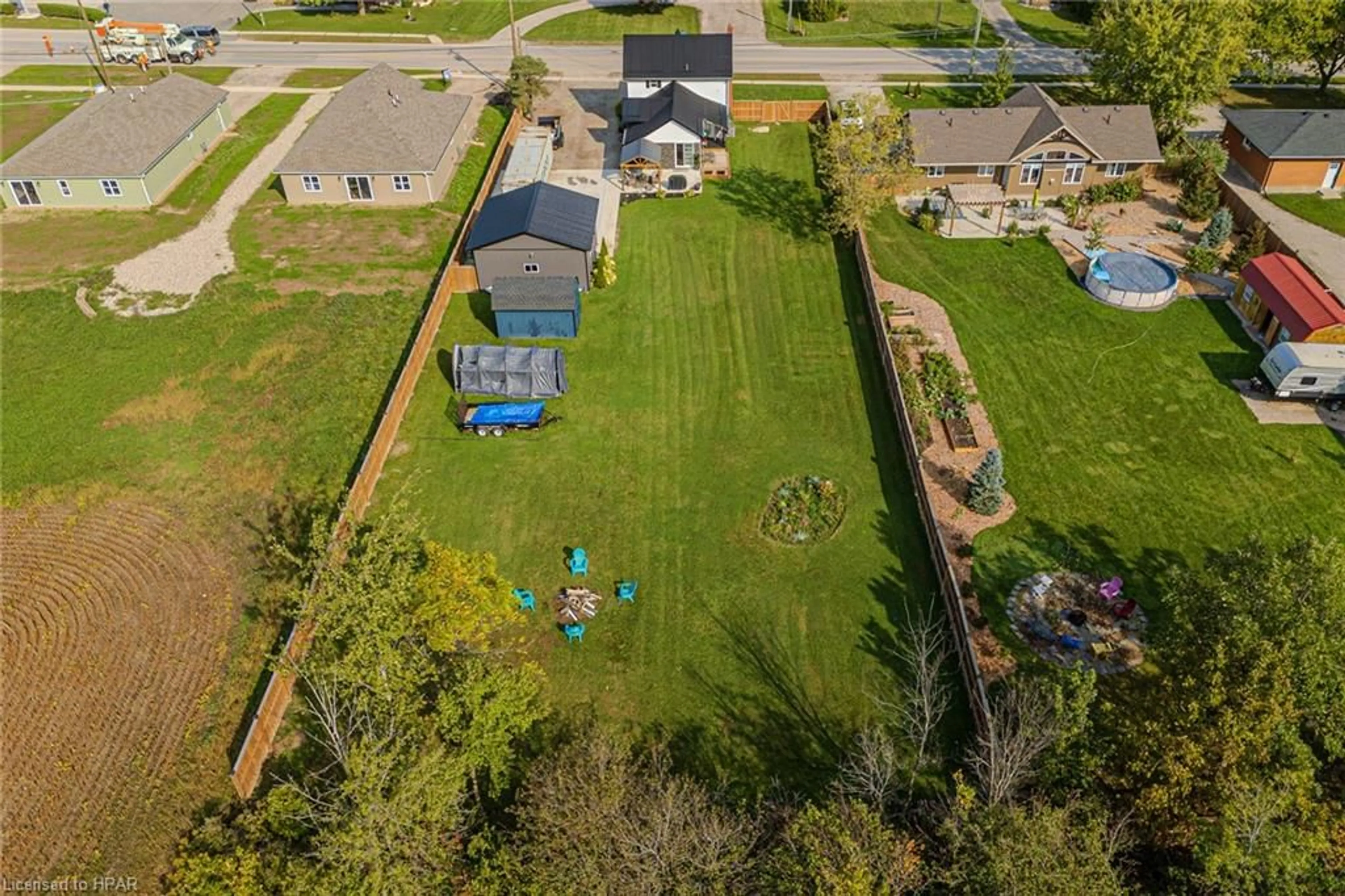 Frontside or backside of a home, the fenced backyard for 145 Victoria Ave, Crediton Ontario N0M 1M0