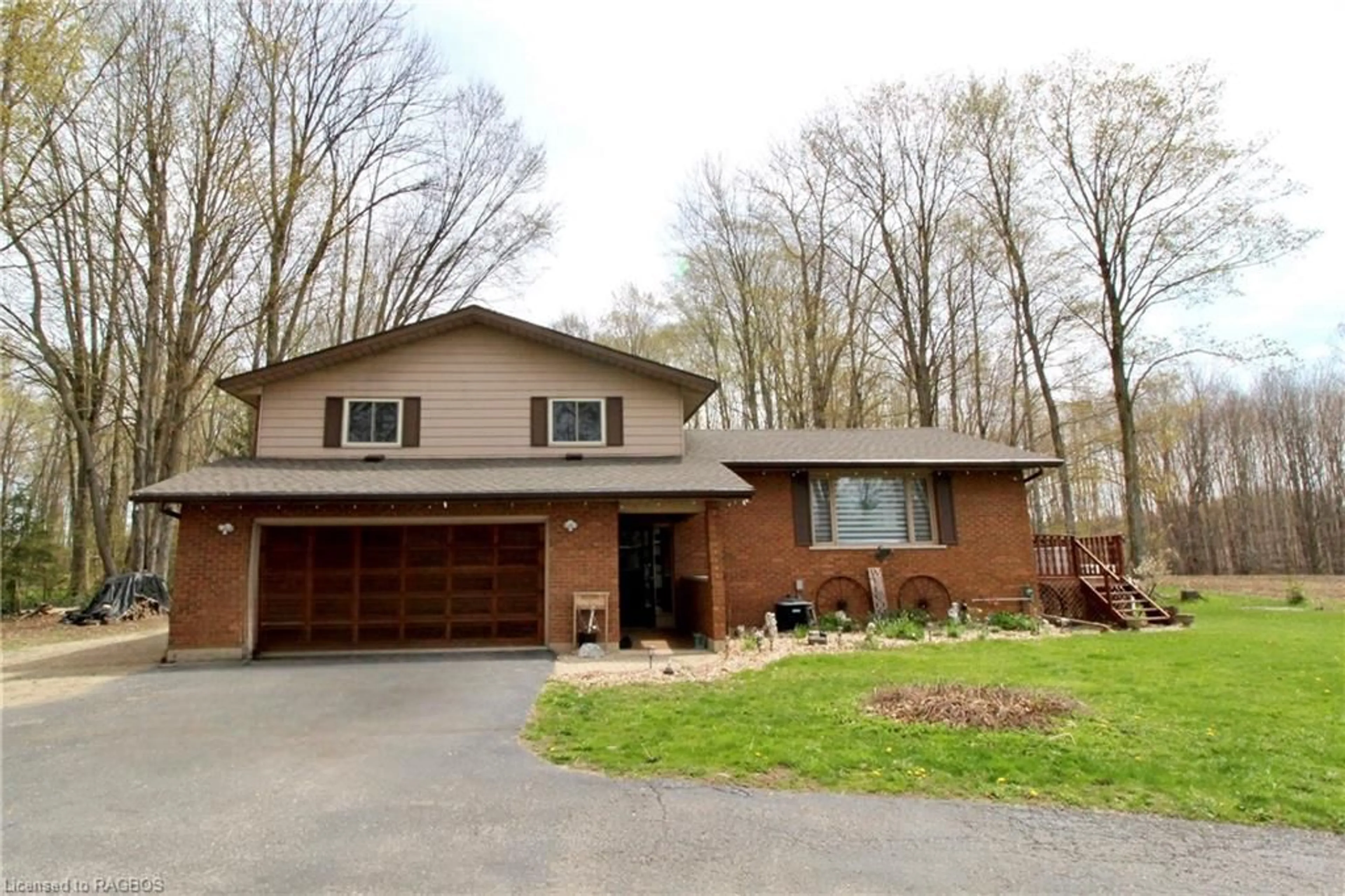 Frontside or backside of a home, cottage for 105 Country Lane Rd, West Grey Ontario N0G 1S0