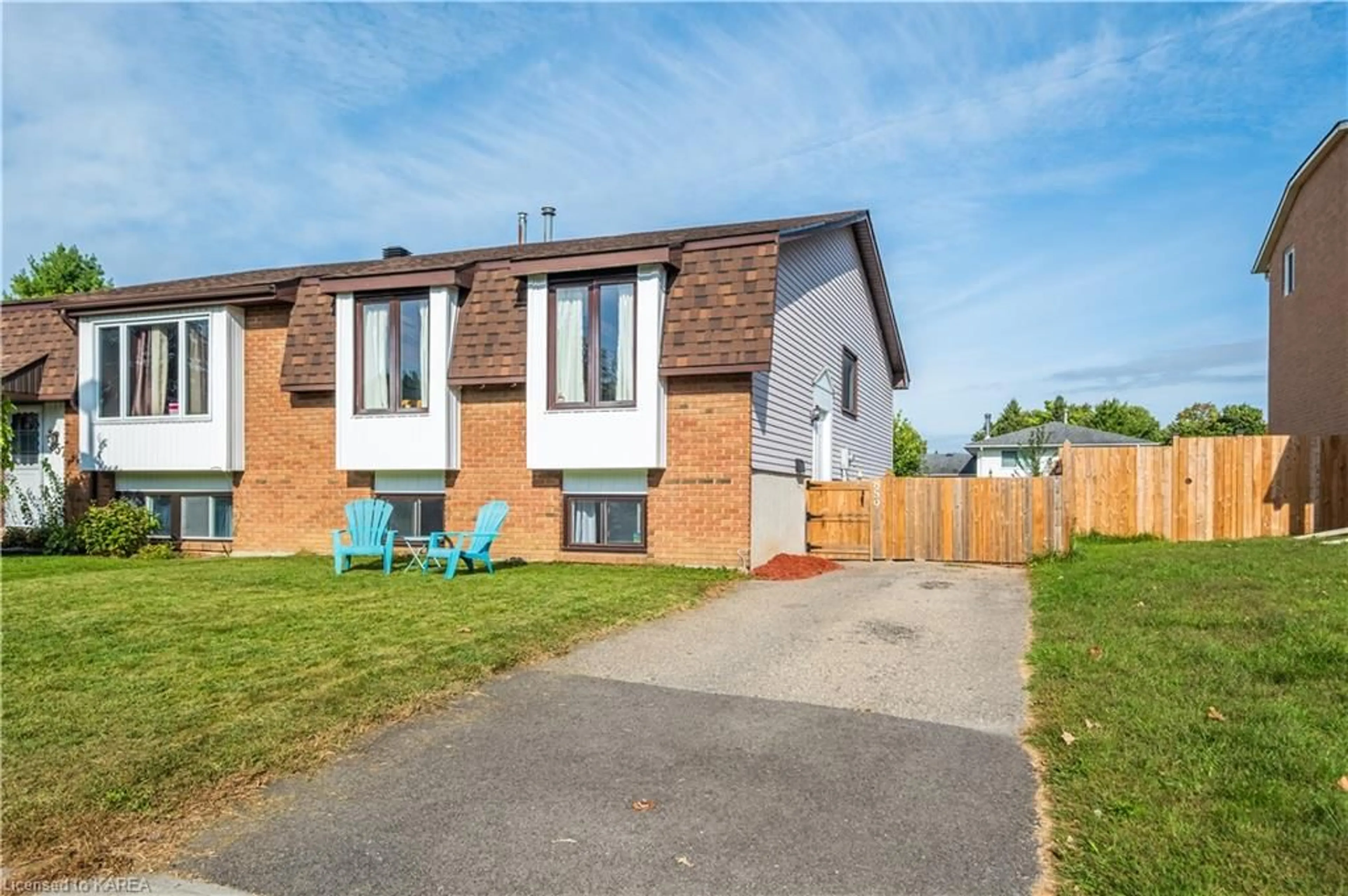 Frontside or backside of a home, the fenced backyard for 859 Cunningham Cres, Brockville Ontario K6V 6H3