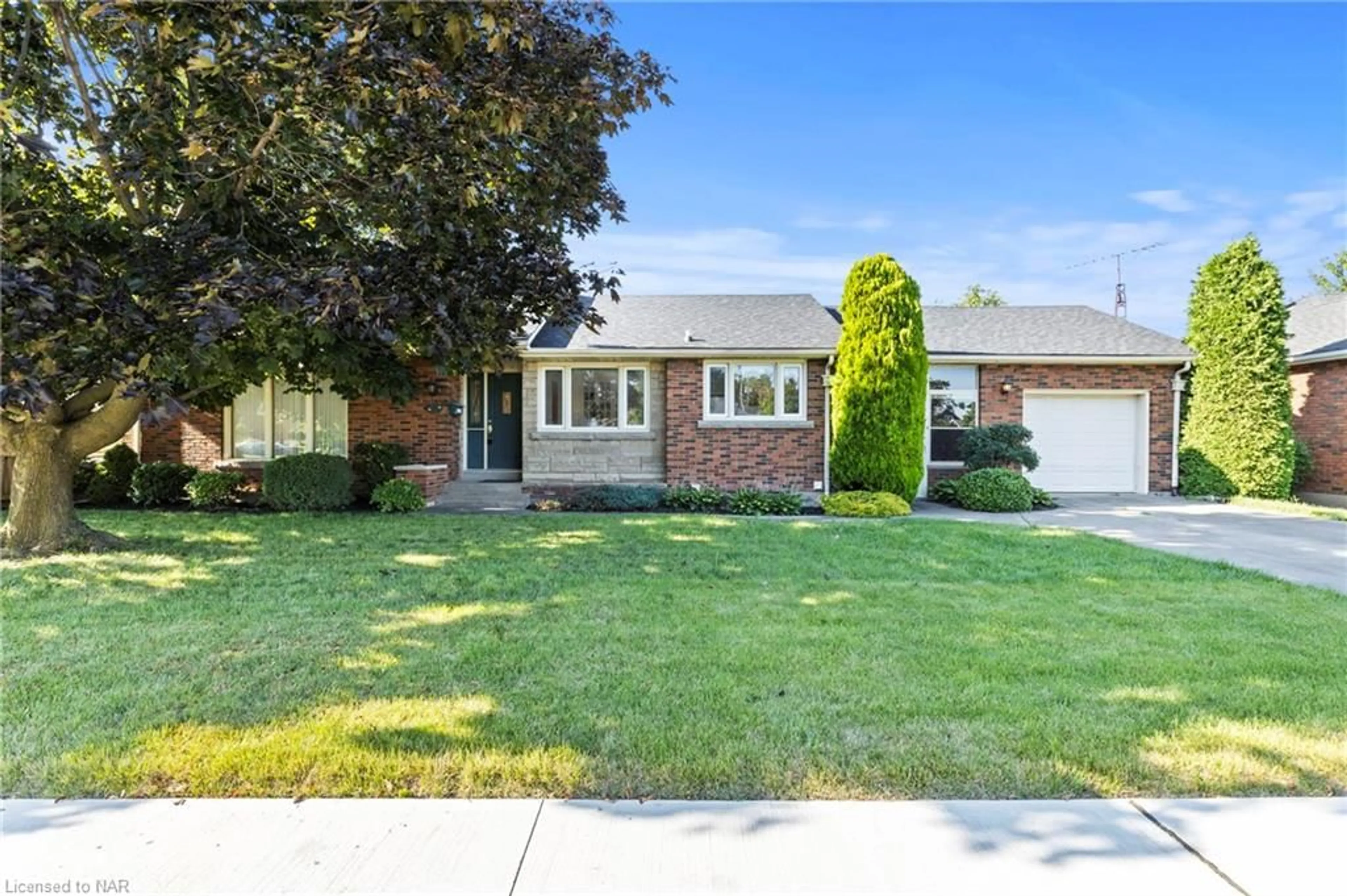 Frontside or backside of a home, the street view for 12 Broderick Ave, Thorold Ontario L2V 2H4