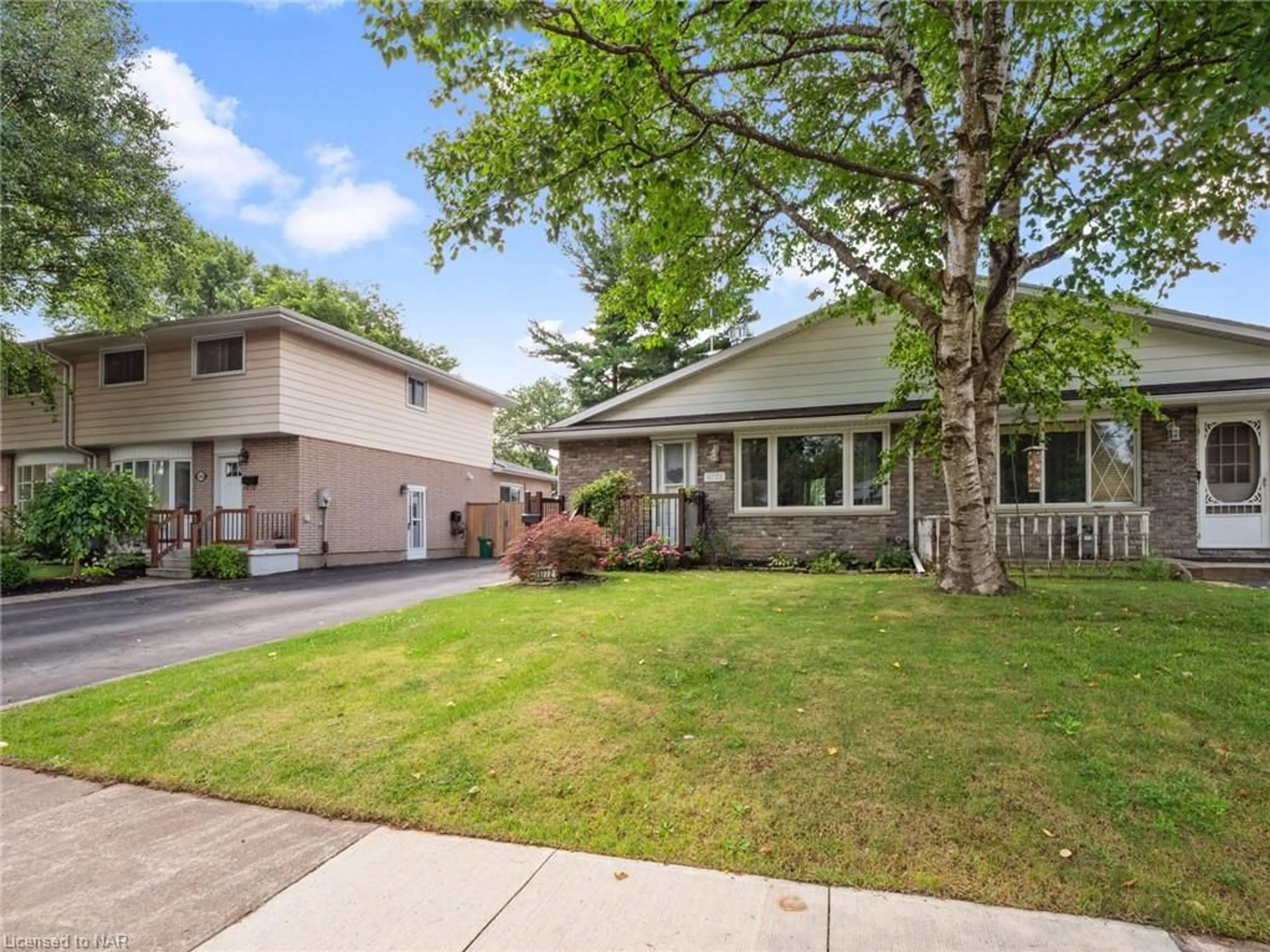 Frontside or backside of a home, the fenced backyard for 6772 Wilinger St, Niagara Falls Ontario L2J 2B3