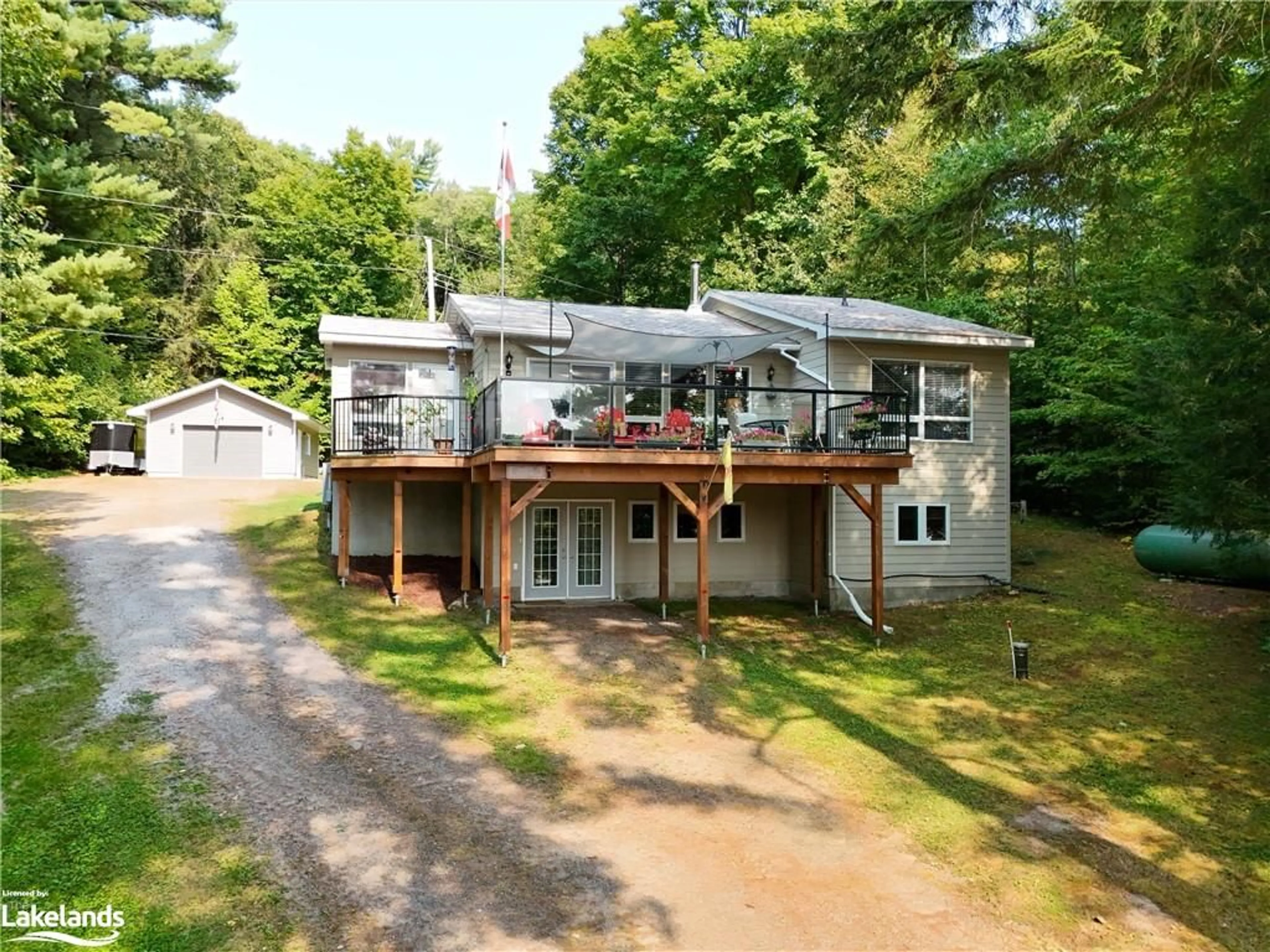 Frontside or backside of a home, cottage for 1041 Big Island Rd, Bracebridge Ontario P1L 1X1