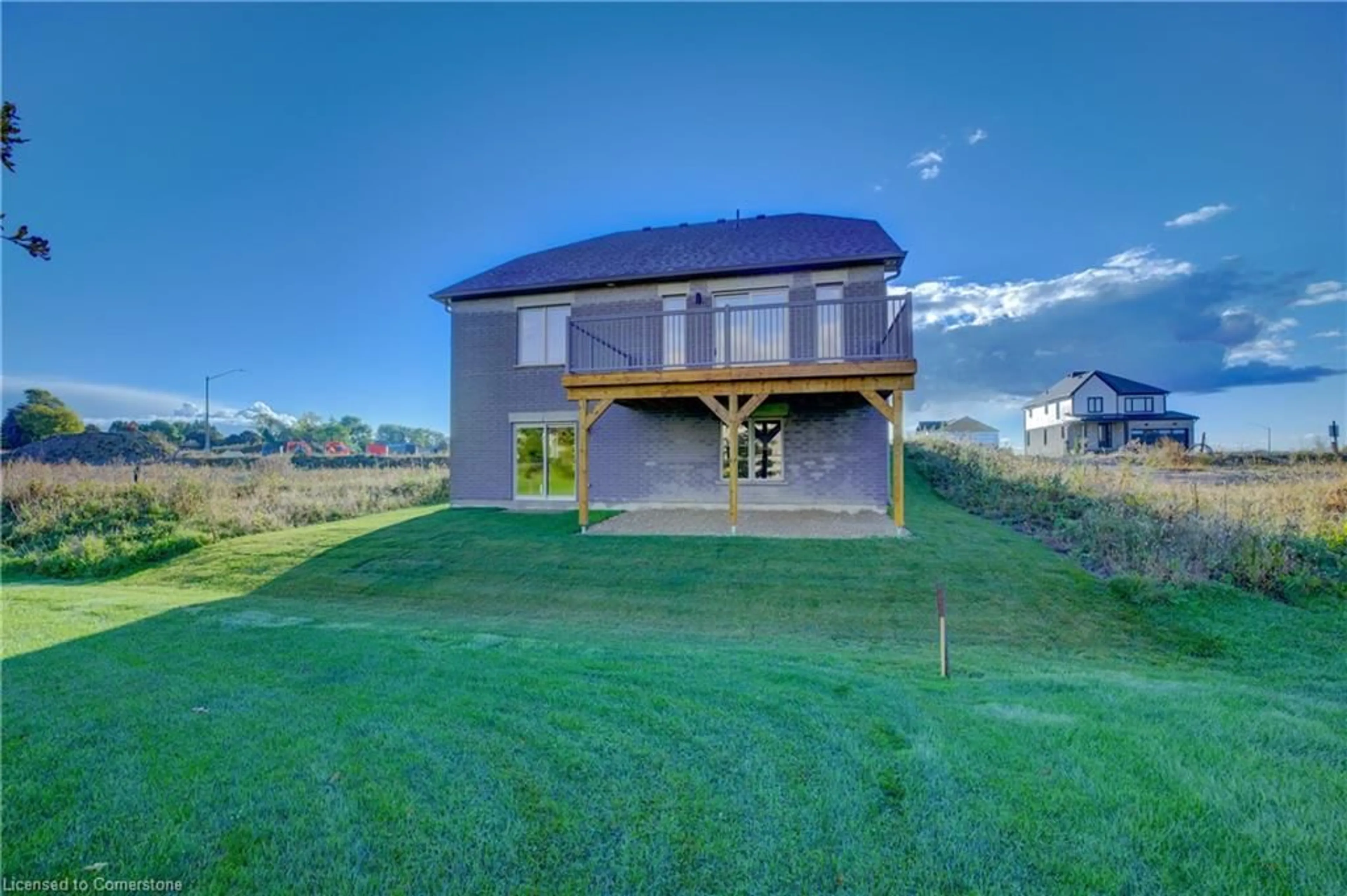 A pic from exterior of the house or condo, the fenced backyard for 113 Bean Street, Harriston Ontario N0G 1Z0