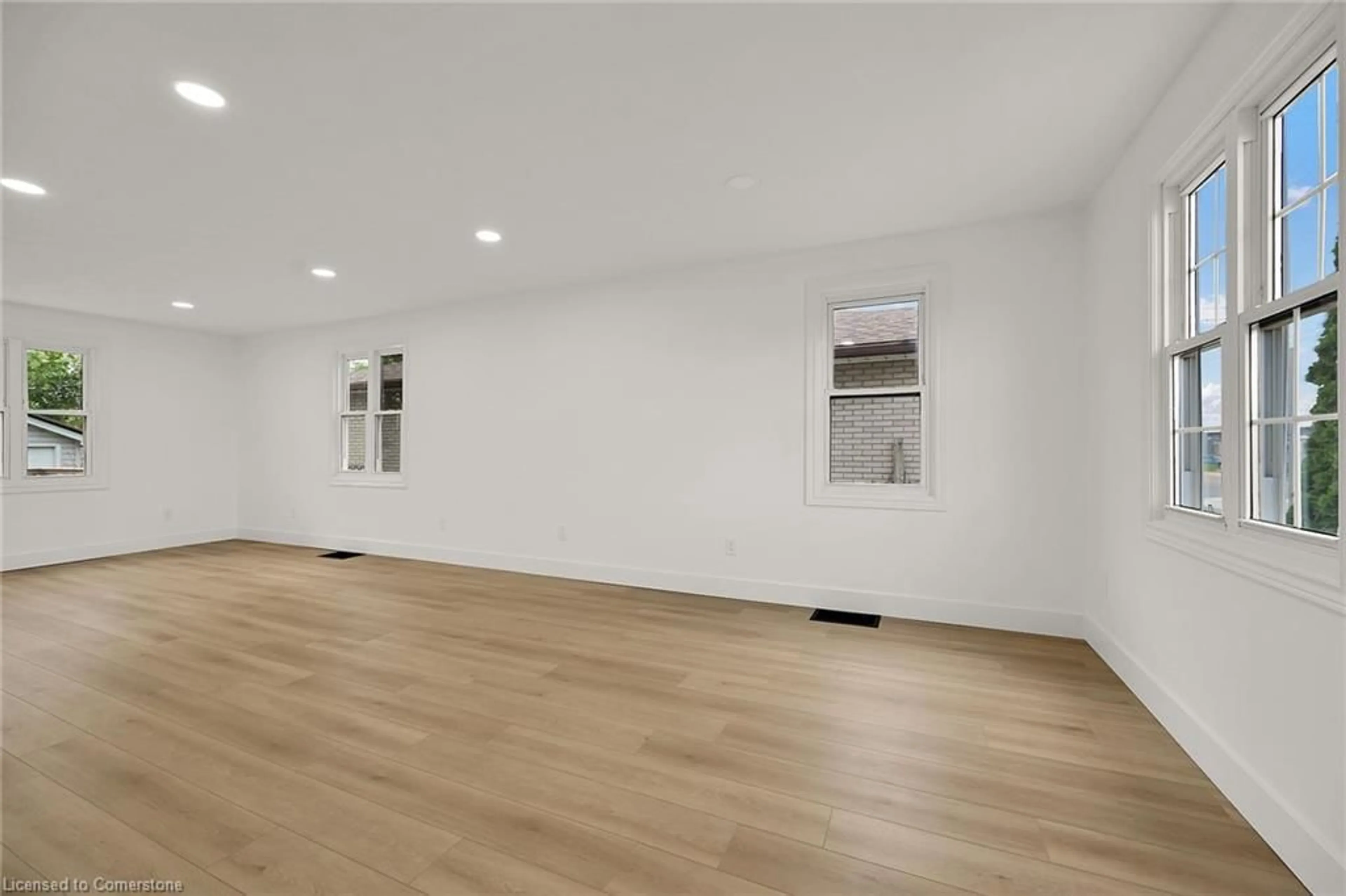 A pic of a room, wood floors for 546 Woodward Ave, Hamilton Ontario L8H 6P1