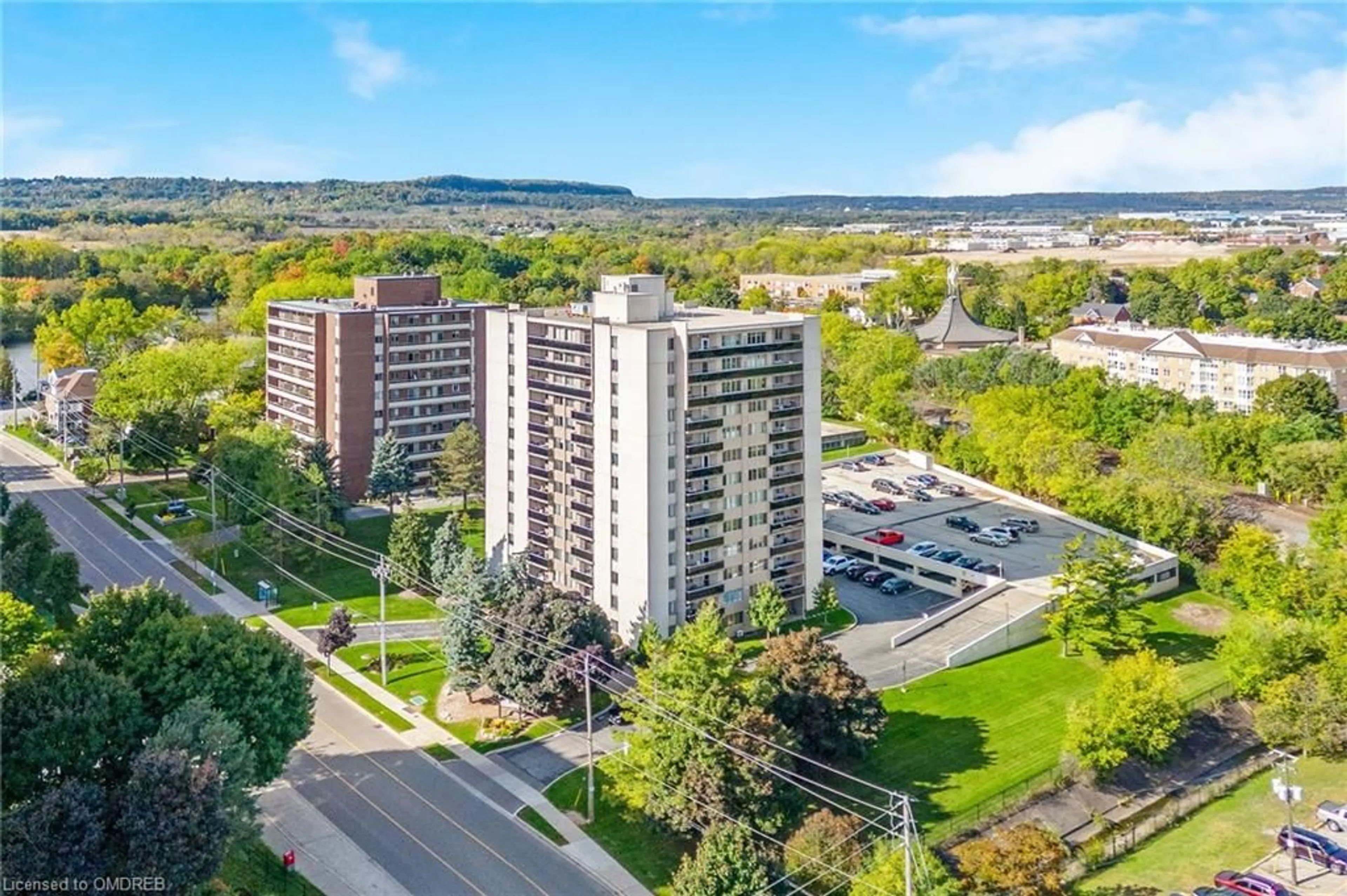 A pic from exterior of the house or condo, the view of city buildings for 81 Millside Dr #1202, Milton Ontario L9T 3X4