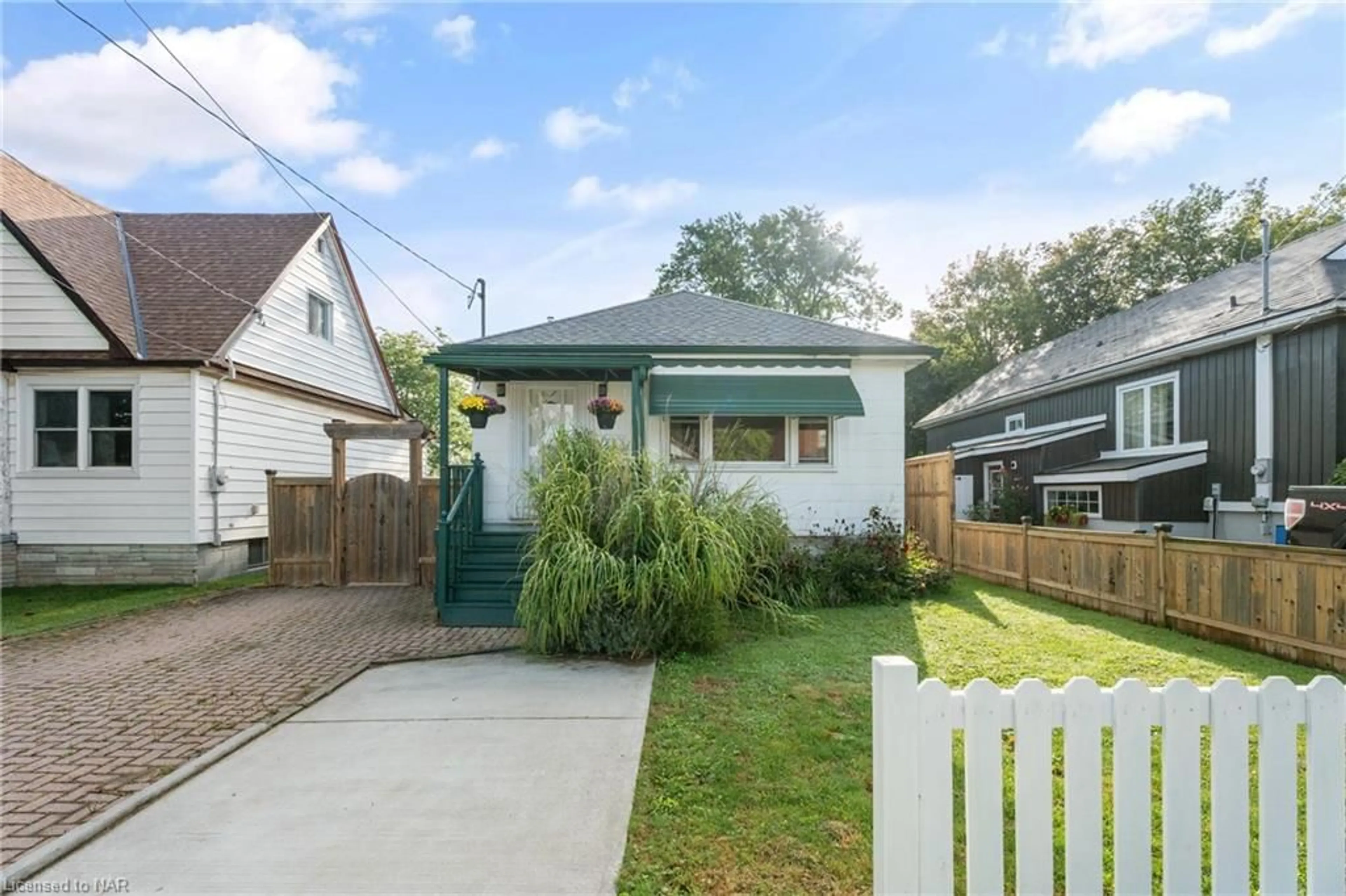 Frontside or backside of a home, the fenced backyard for 4456 Sixth Ave, Niagara Falls Ontario L2E 4T1